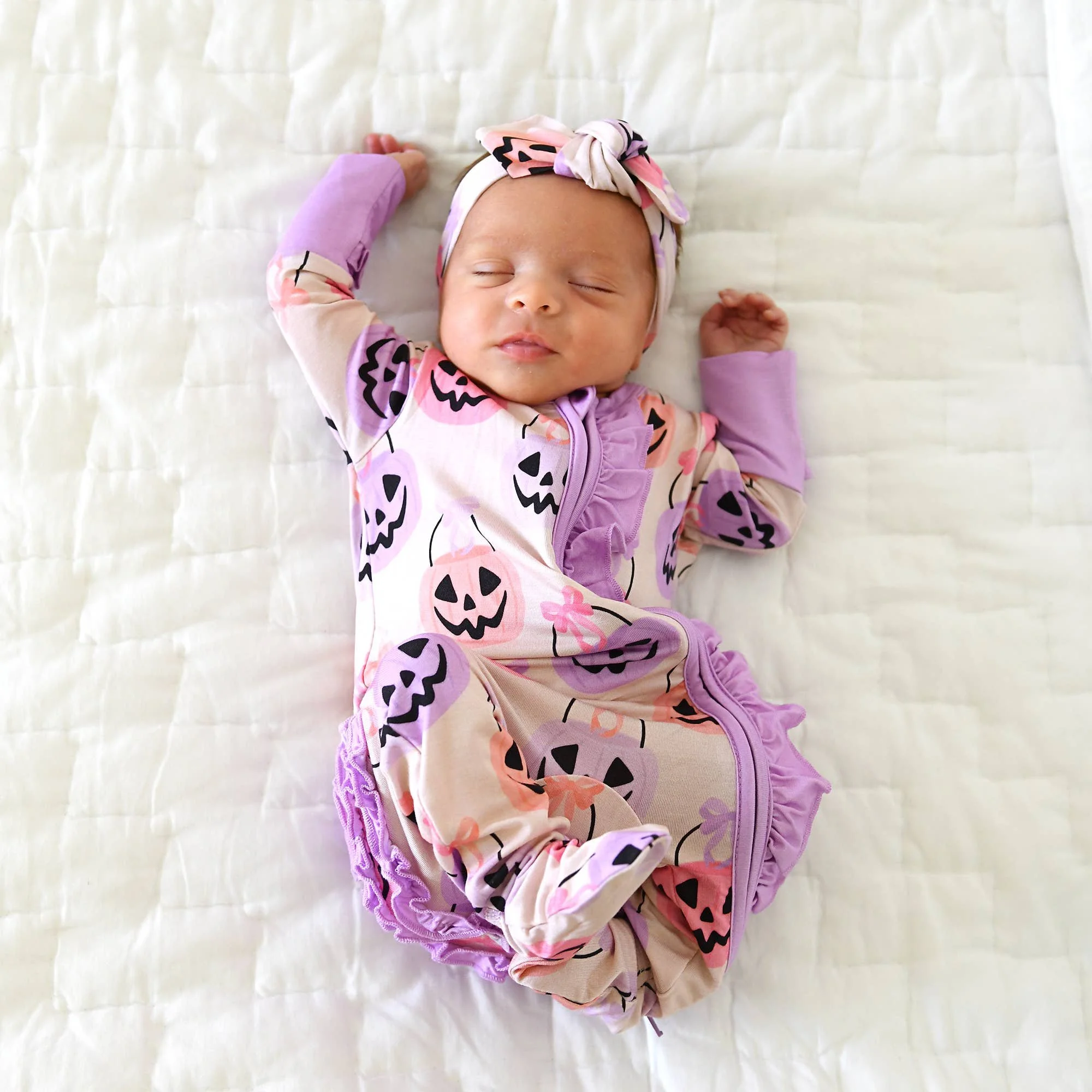 emmy-ruffle-zip-bamboo-halloween-pumpkins-baby-outfit-7.jpg