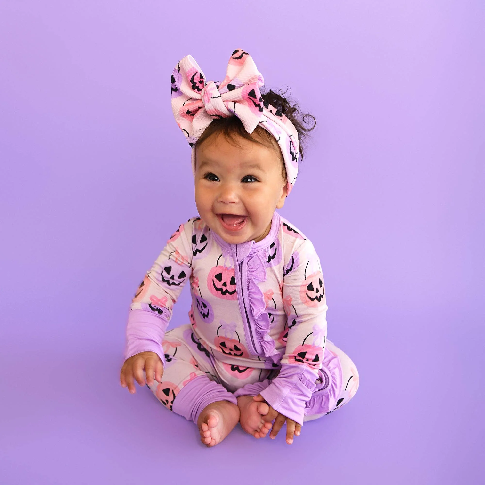 emmy-ruffle-zip-bamboo-halloween-pumpkins-baby-outfit-23.jpg