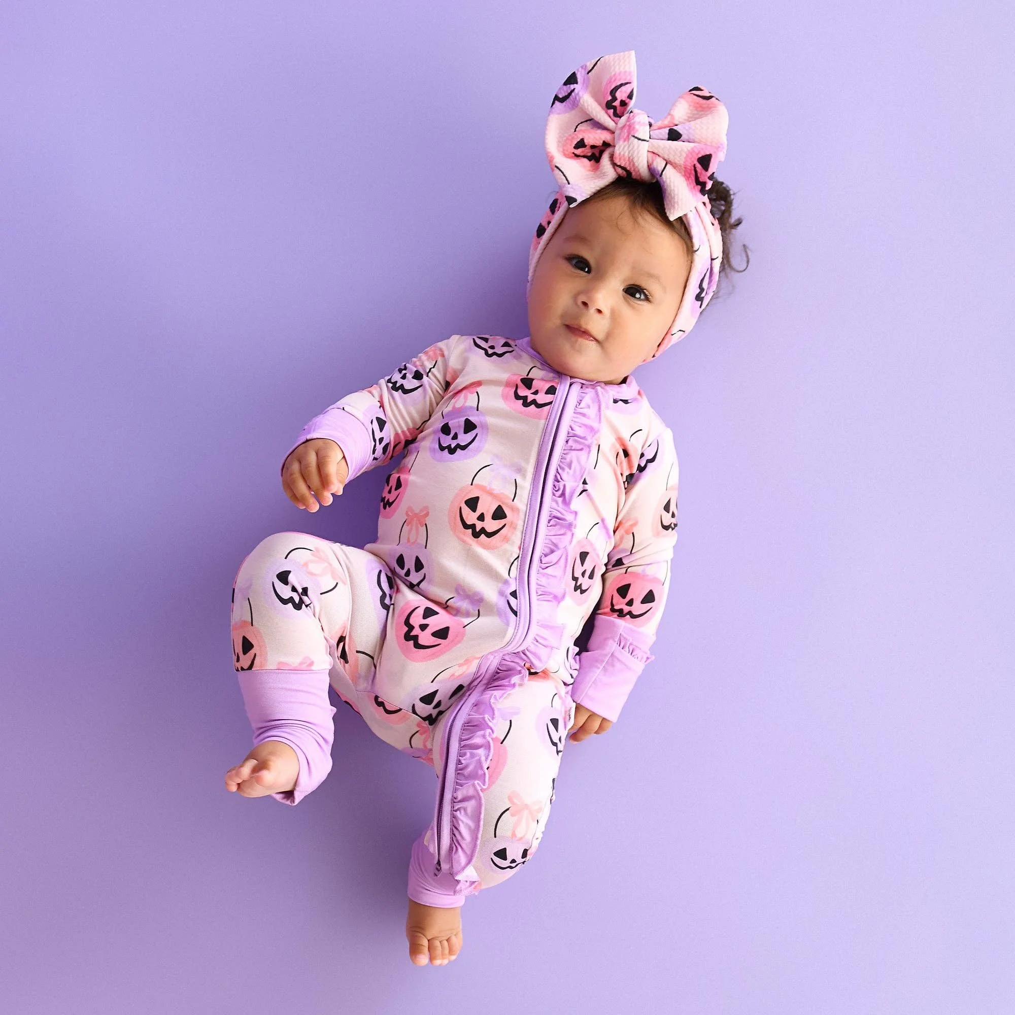 emmy-ruffle-zip-bamboo-halloween-pumpkins-baby-outfit-3.jpg