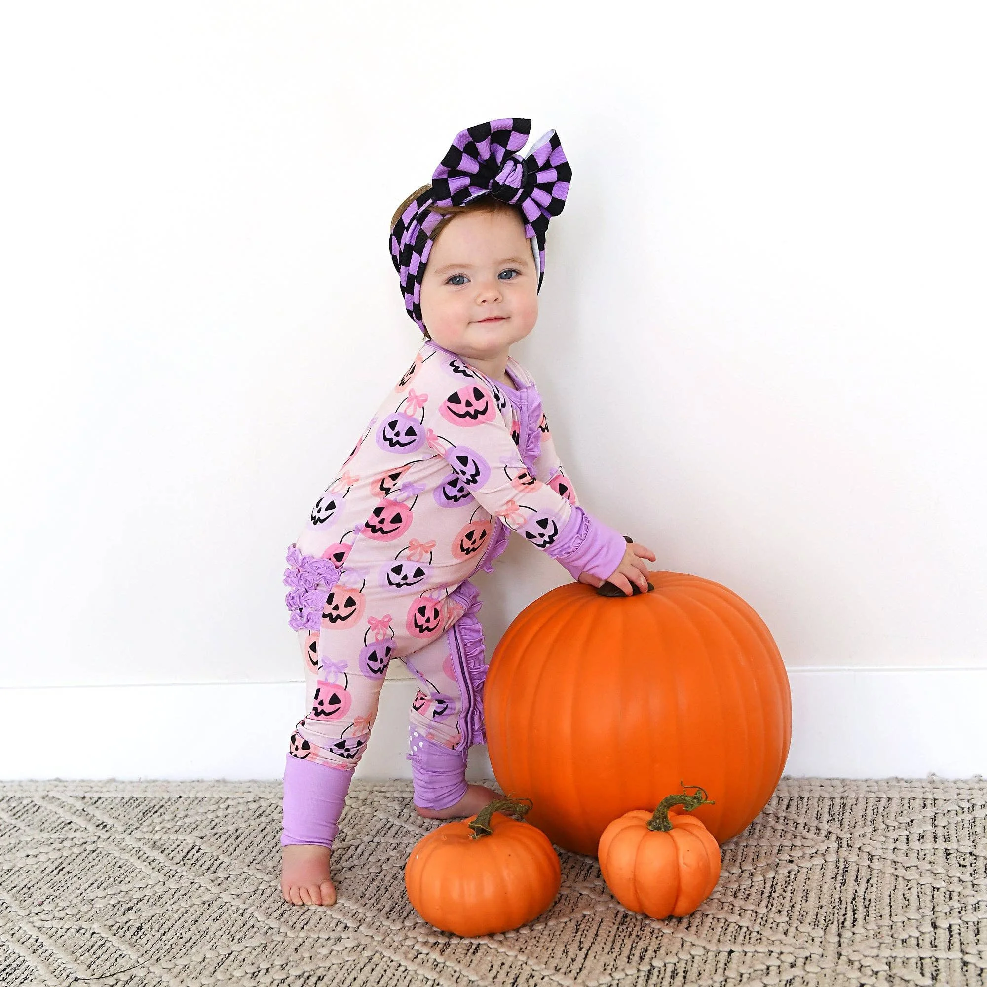 emmy-ruffle-zip-bamboo-halloween-pumpkins-baby-outfit-18.jpg