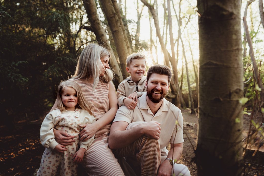Playful family photoshoot at sunset in Saffron Walden, Essex.