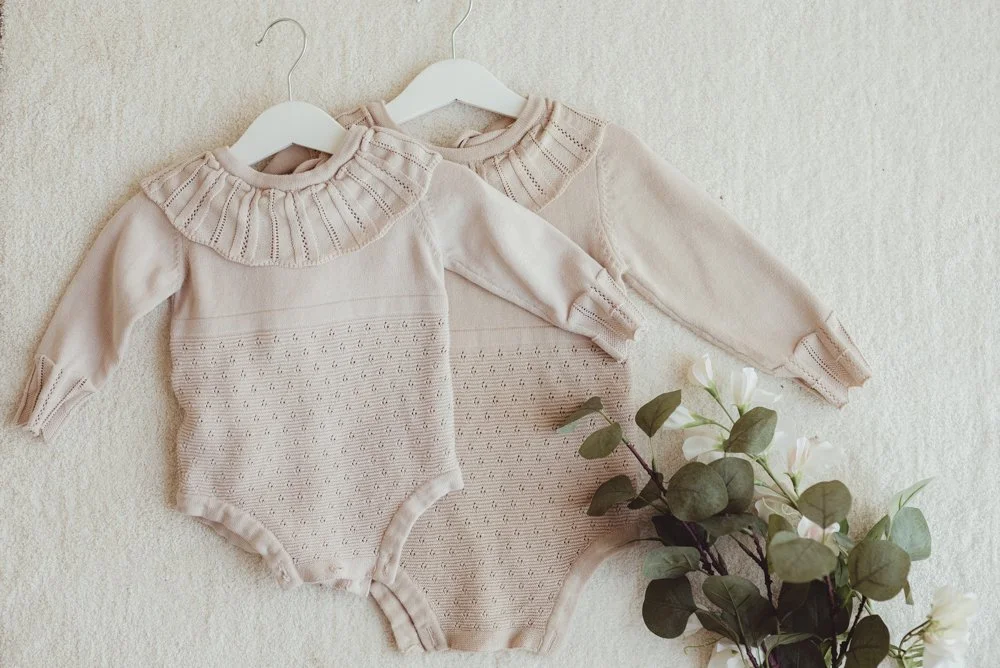 Matching rompers 6-9 months and 12-18 months.