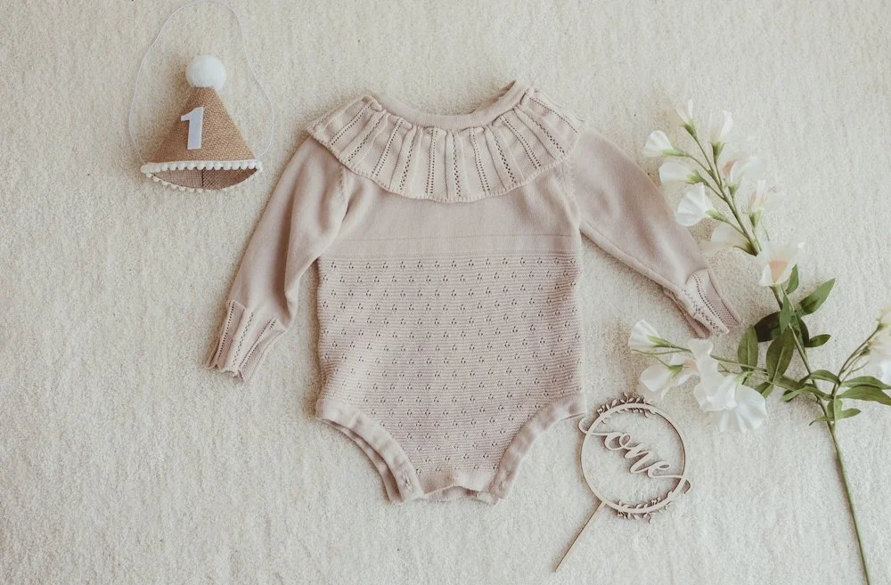 Cream knitted romper 12-18 months