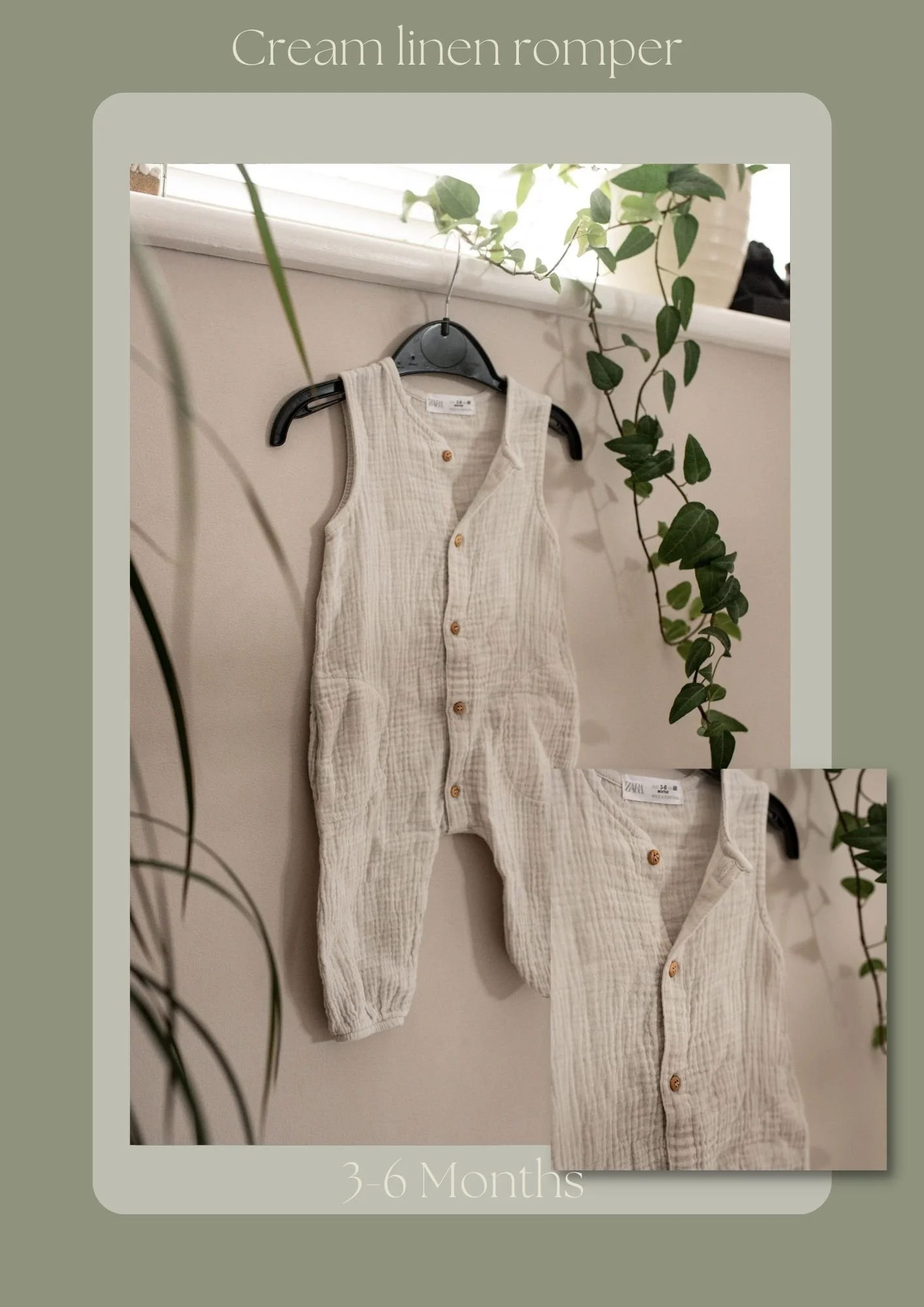 A cream-colored linen romper for 3 to 6 months old, hanging on a black hanger against a wall with greenery.