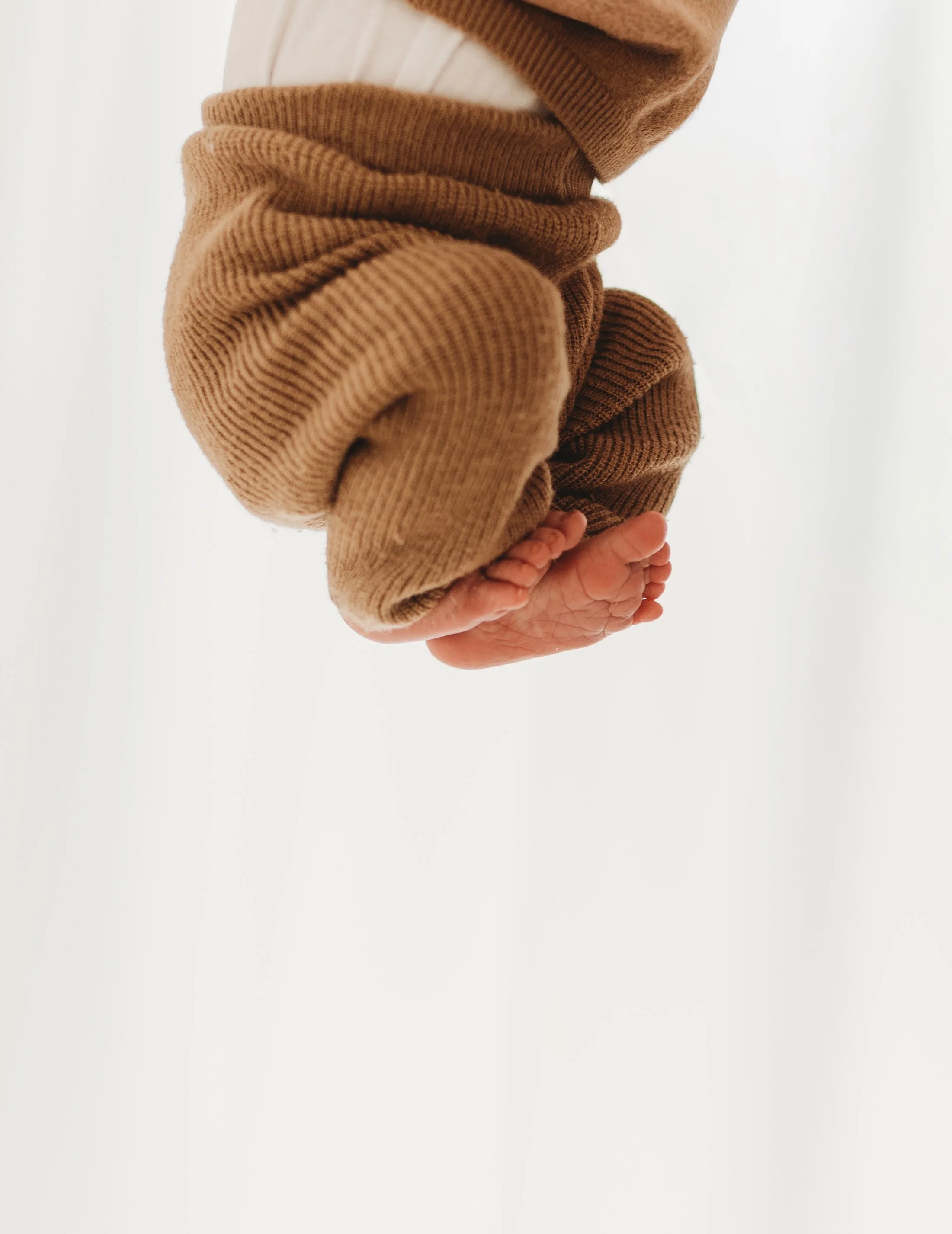 Newborn scrunch captured during newborn photoshoot, Saffron Walden essex, Jodie Wilson Photography.