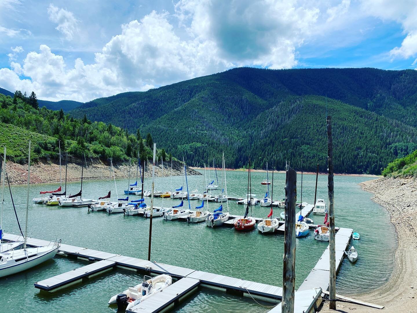 Sailed through the Colorado Rocky Mountains and cool Ruedi Reservoir waters this summer during our summer vacay #lakesailing #aspenyachtclub #ruedireservoir #sailaspen