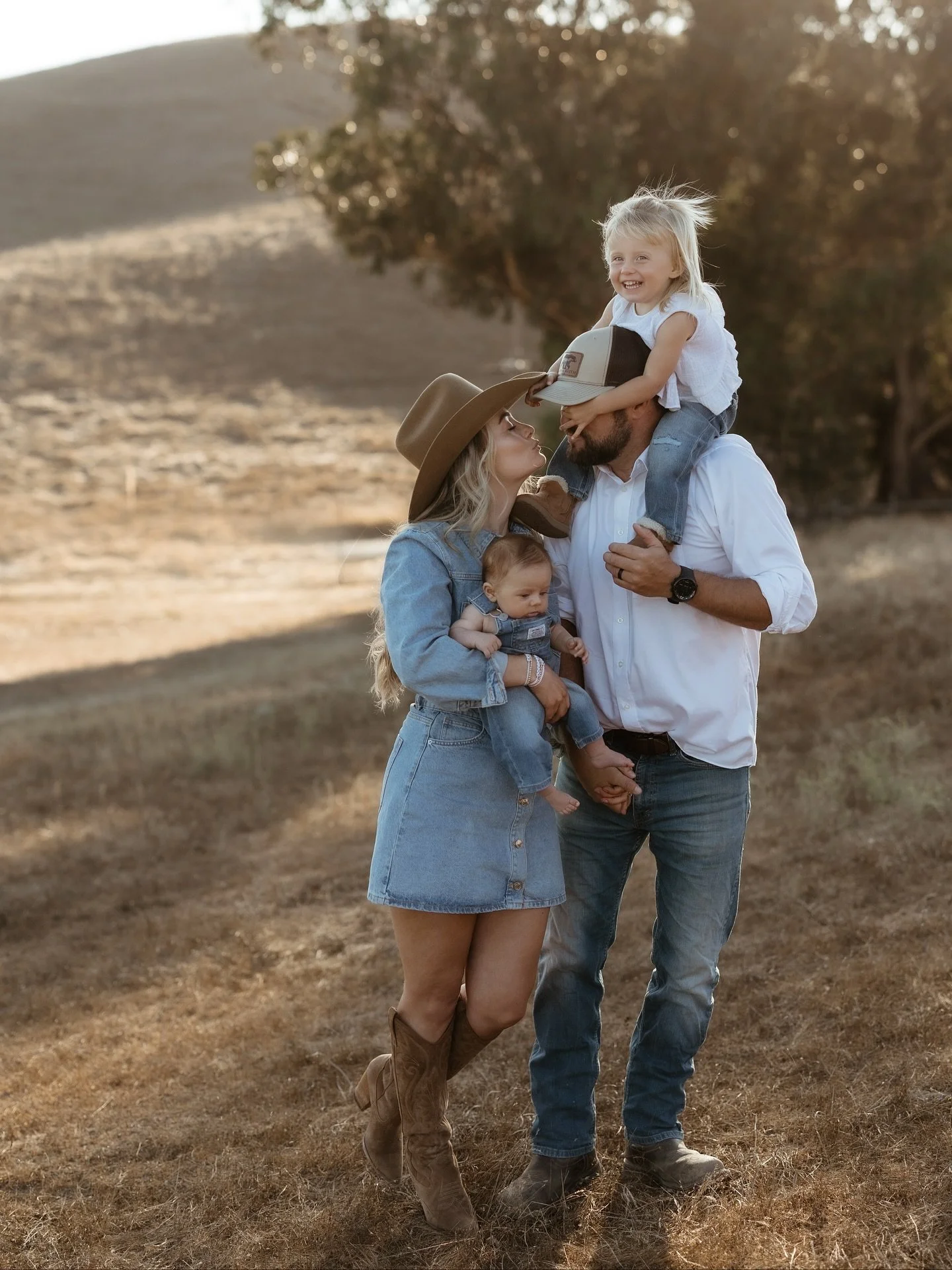 Denim + cowboy boots + newly party of 4 💙