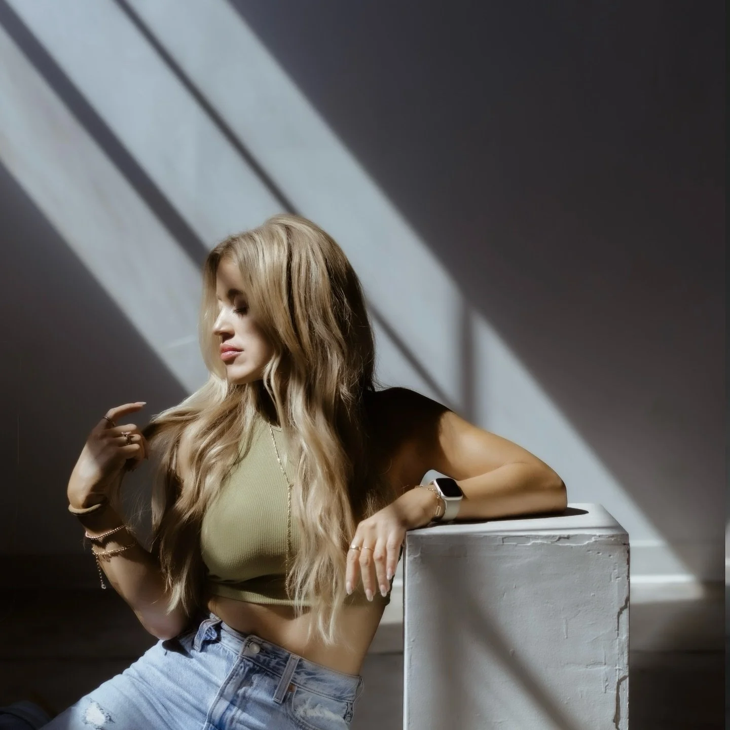 Before the client arrives, the photographer becomes the muse.