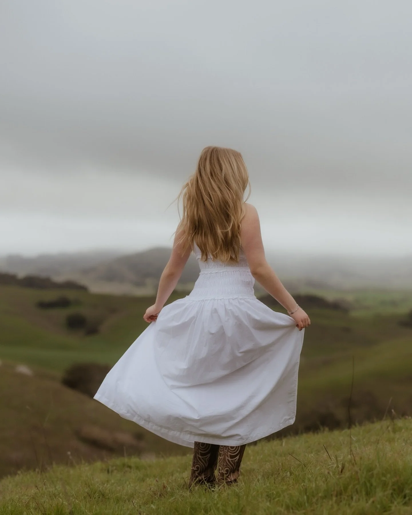 When rain wasn&rsquo;t in the forecast, you do the rain dance and hope for the best. Senior pics: 1, Weather: 0