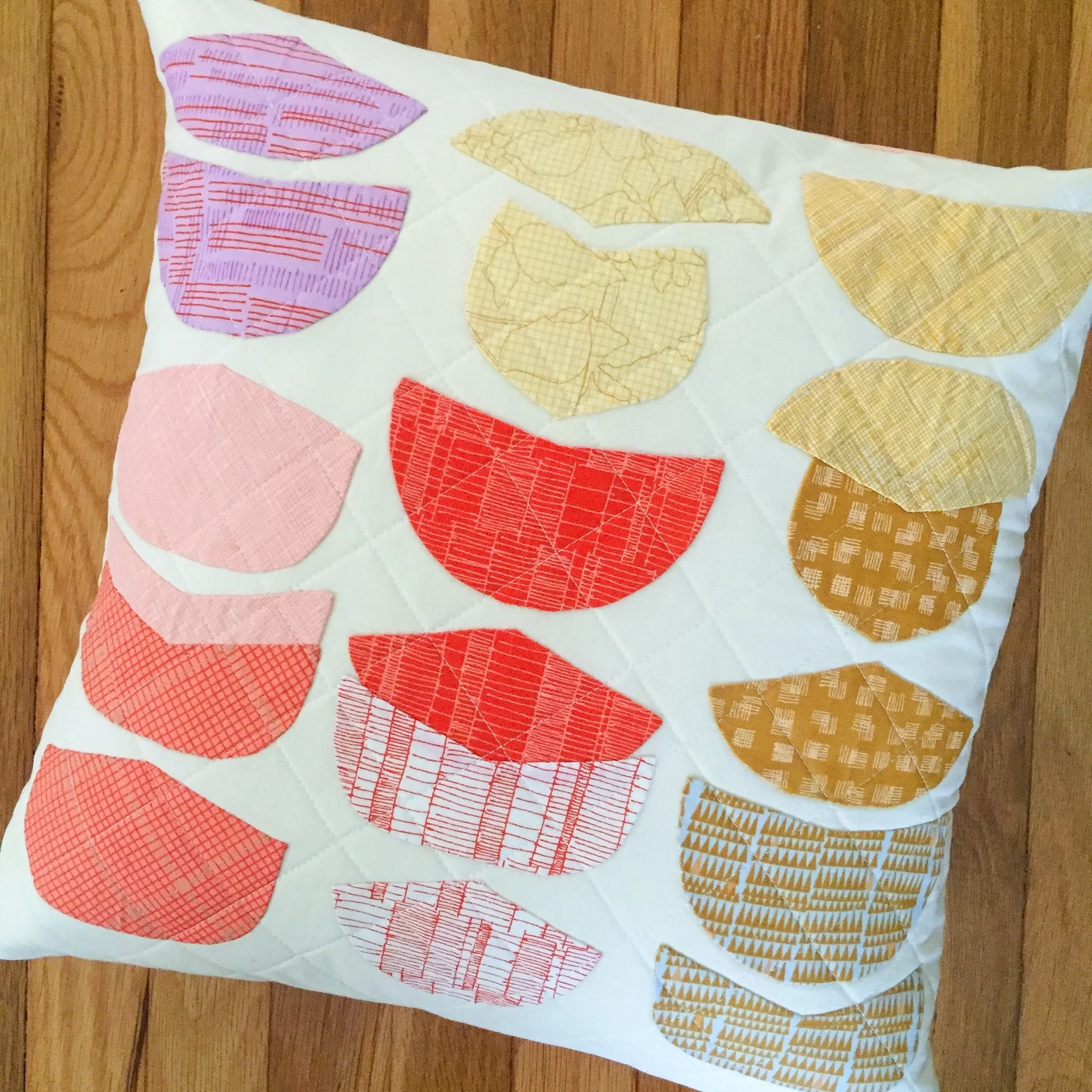 Applique project: Pillow made using Ebb pattern by Carolyn Friedlander