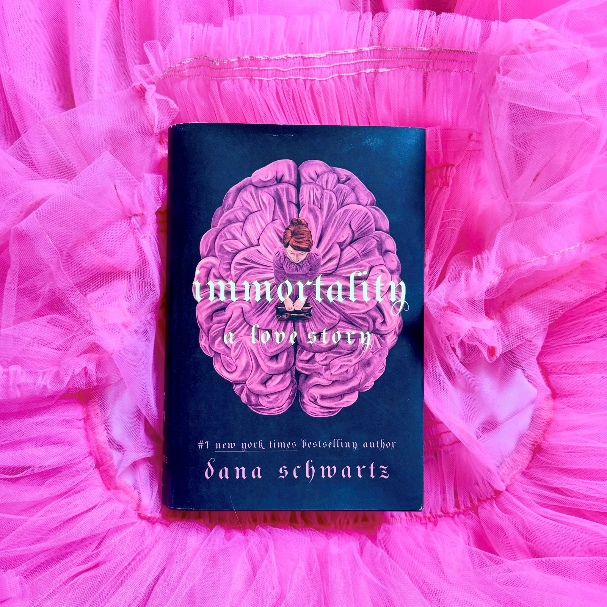 Loving our April pick? Doing forget to pick up the sequel: IMMORTALITY by @danaschwartzzz 🧠