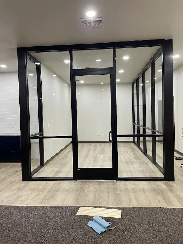 Interior storefront glass office partitions installation in San Antonio, Texas