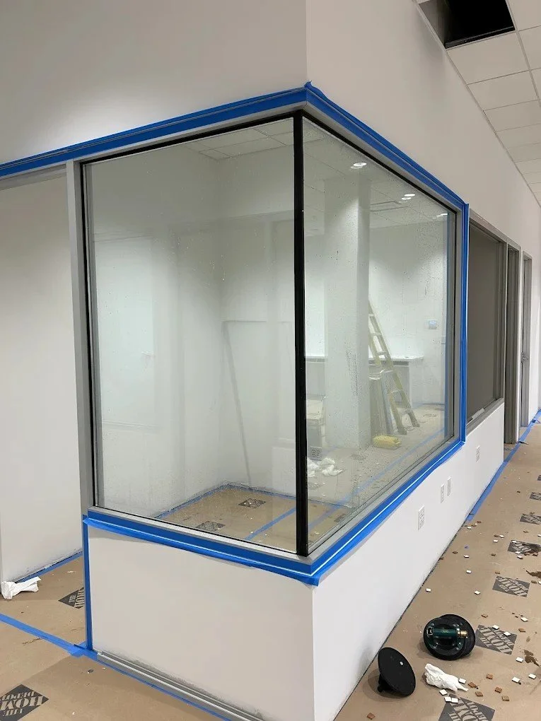 Interior insulated sound deadening business meeting glass office partitions installation in San Antonio, Texas