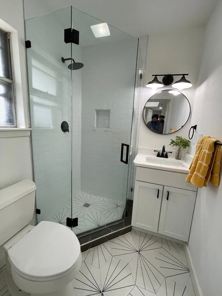 Custom octagon hexagon shaped frameless corner shower enclosure installation in San Antonio, Texas