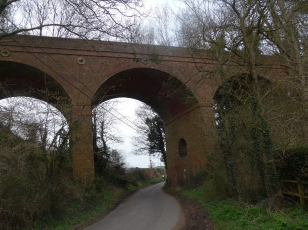  Photo of tree shrouded bridge 2017 Northington Rd, just east of Itchen Abbas Station 