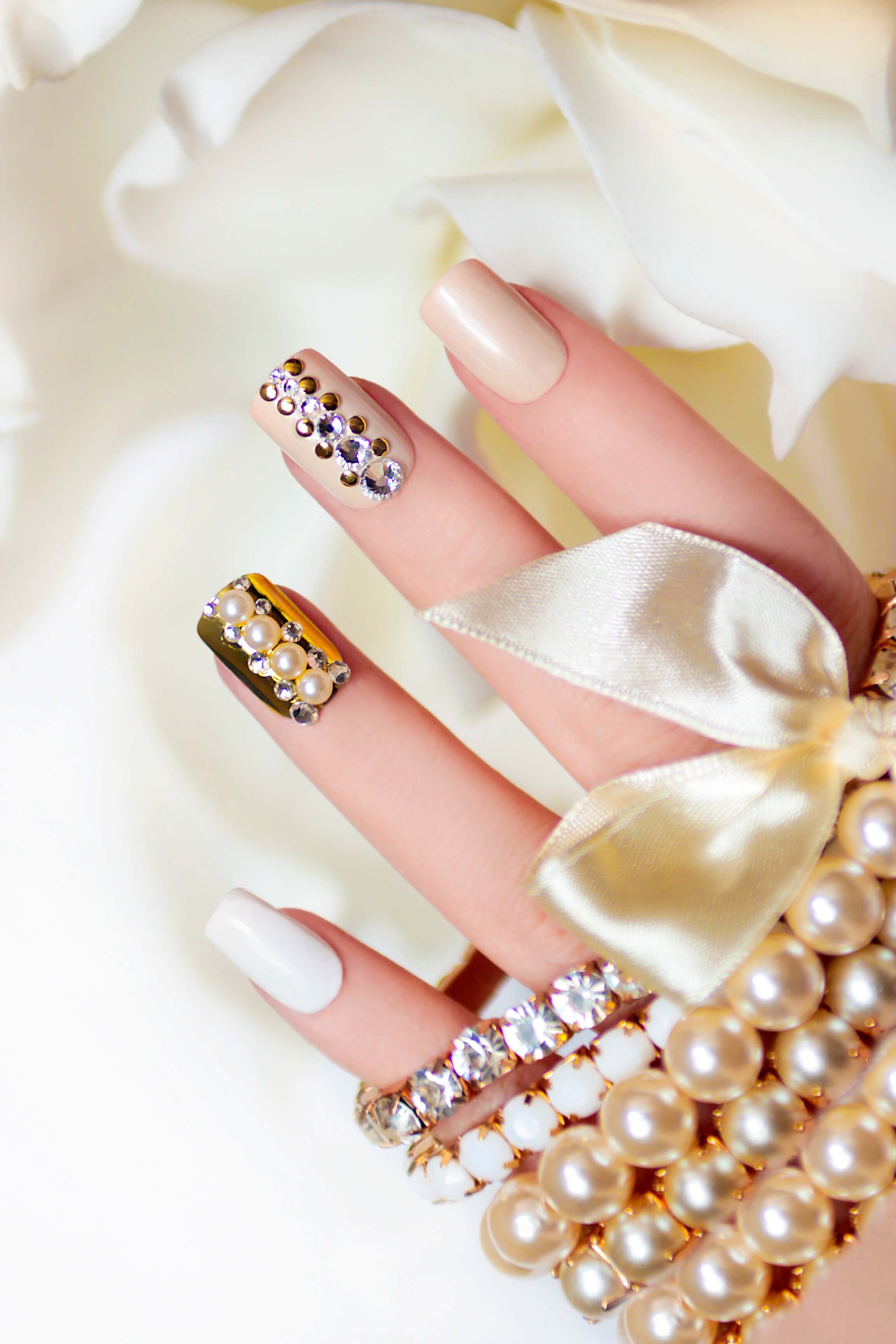 Small+manicure with gold rhinestones