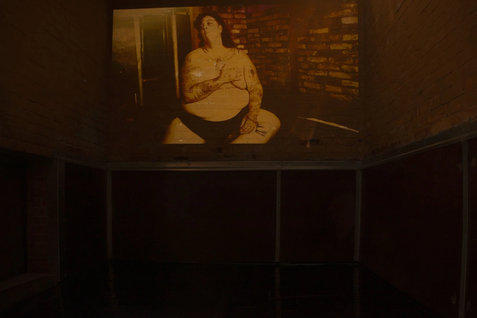 Tremble, 2022 (Installation still) As part of my extended installation iteration of 'Tremble' at Bärenzwinger Art Gallery in Berlin, DE, I installed video in the old cages where the bears of Berlin used to reside. 