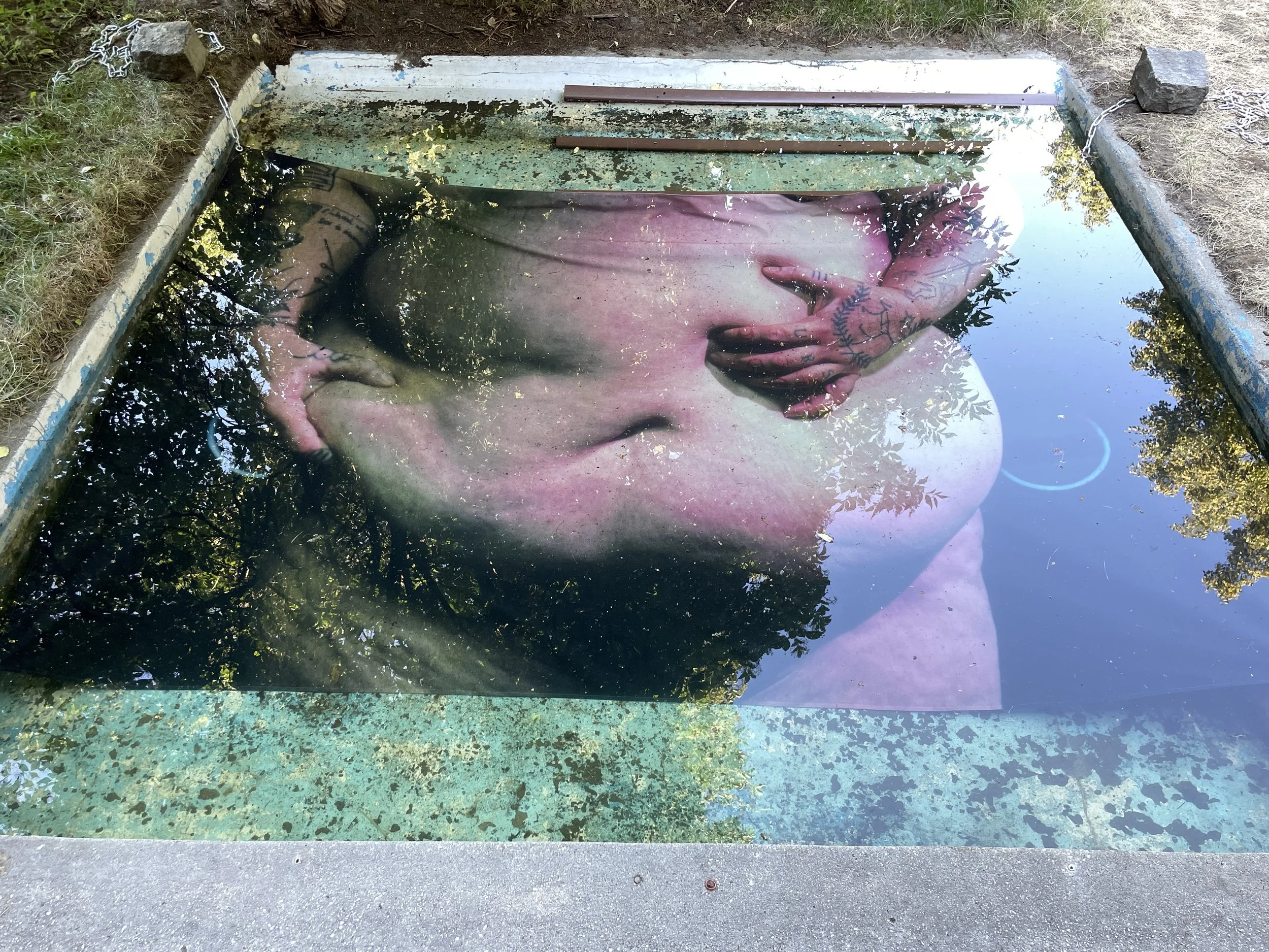 Tremble, 2022 ( Bear Bath, Still #1), ink jet print on water resistant fabric. 

As part of the site specific installation iteration of 'Tremble' at Bärenzwinger Art Gallery in Berlin, DE, I submerged films still printed on water resistant fabric in 