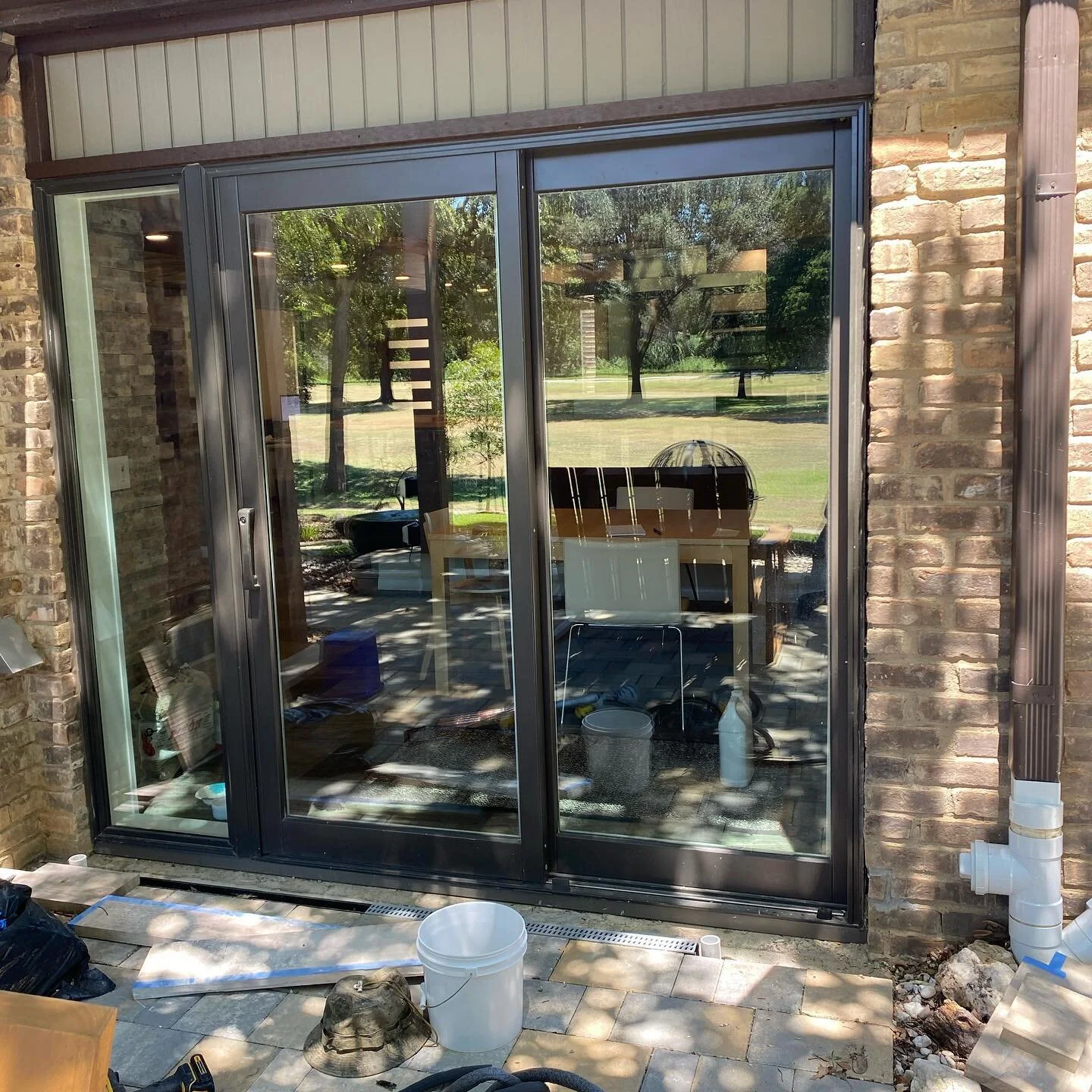 Residential cut  out pack and reseal perimeter sliding door frames .A project for @ohanaservicescontractors speacial bronze material NP1.