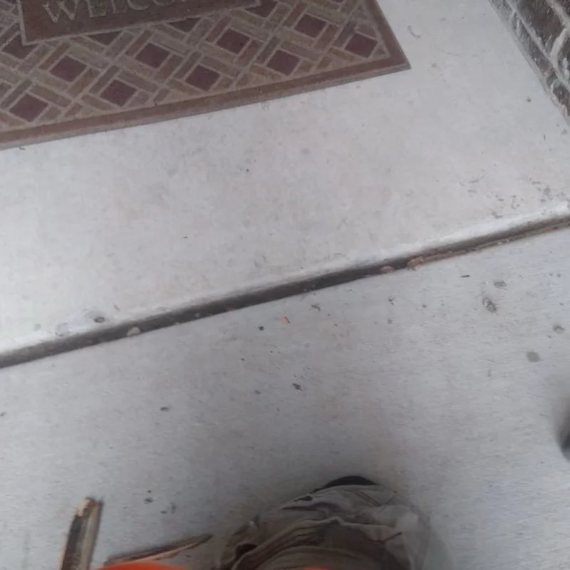 Residential driveway and side walk joints prepped and sealed . Master Seal polyeurathane NP2 limestone with sand