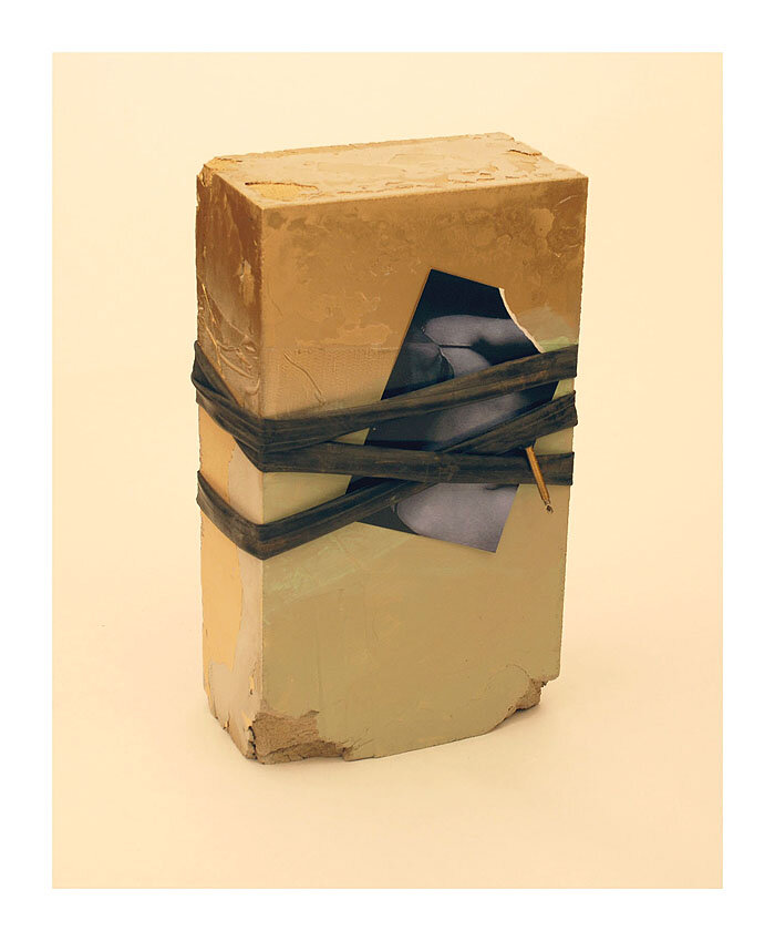 Untitled, 2009. Concrete, bicycle tubing, spray paint and photograph, 15 x 7 x 5 in.