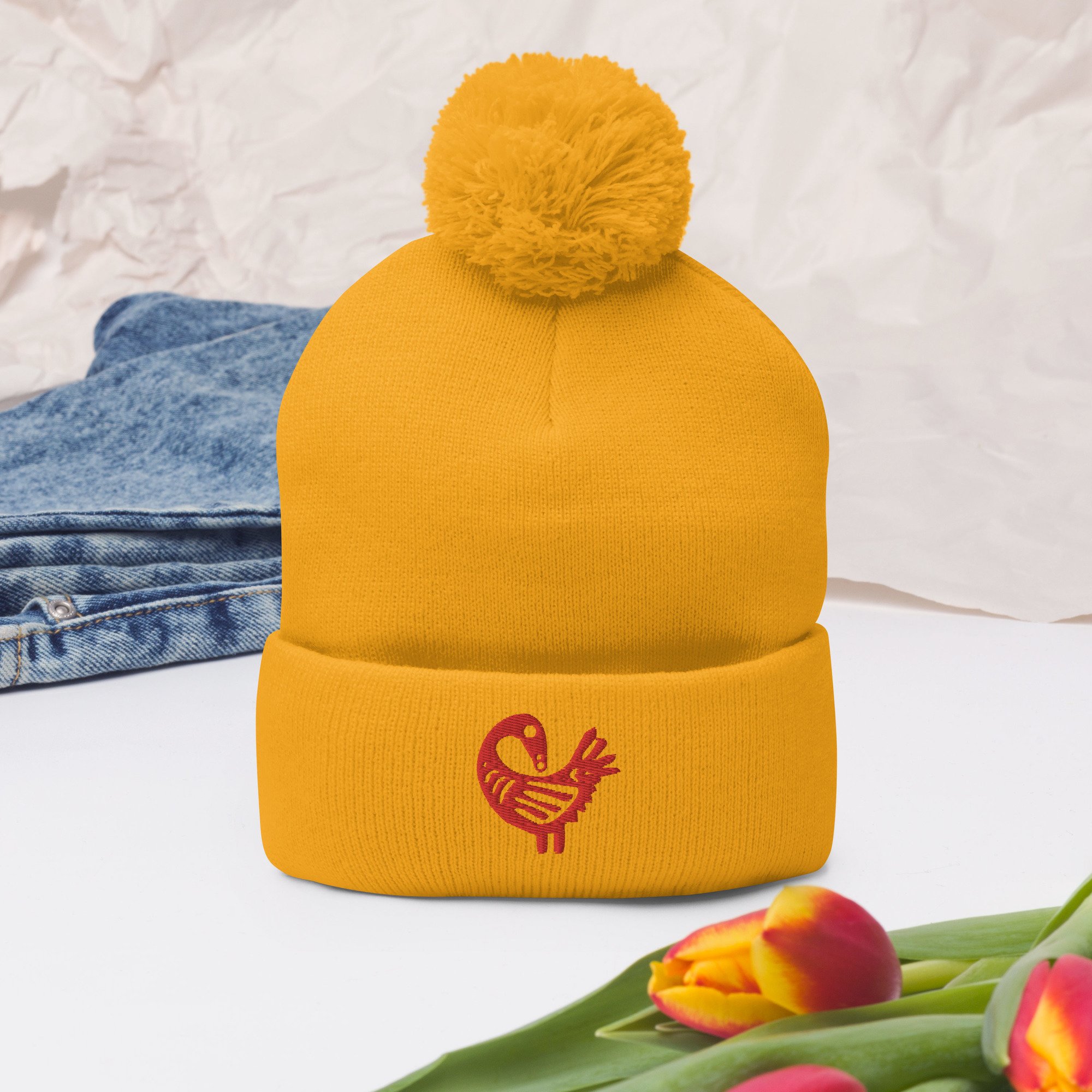 pom-pom-knit-cap-gold-front-2-63779a9f8faad.jpg