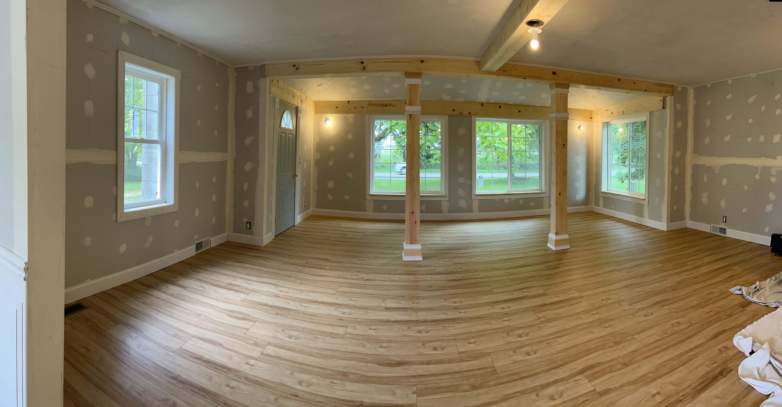 Living Room - after ( Entry way living room and dining incorporated into one open space )