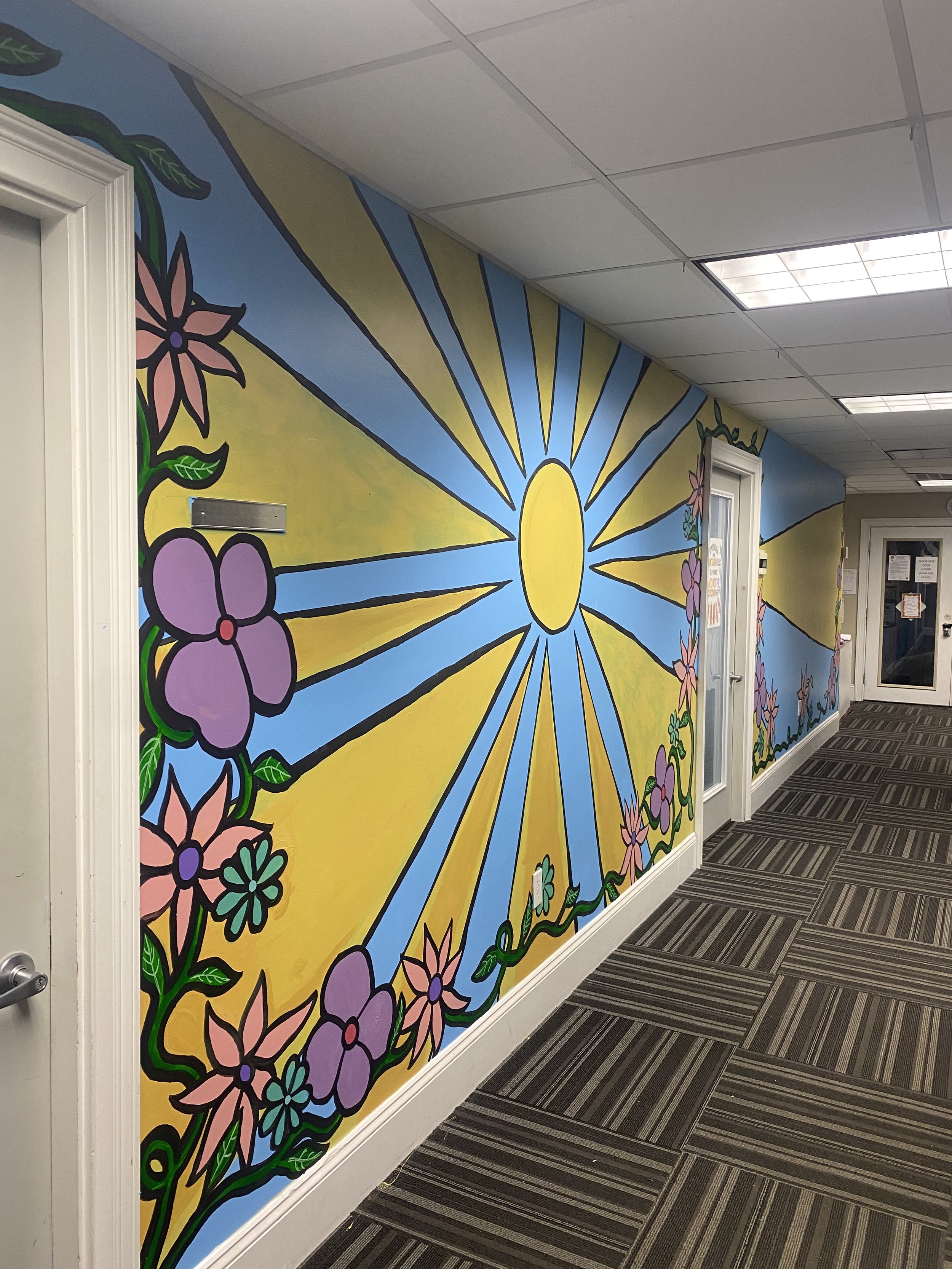 A Drop of Sunshine, volunteer mural with sourced paints, for the ASTRO Center located in Pawtucket RI, 2025. (Image 1)