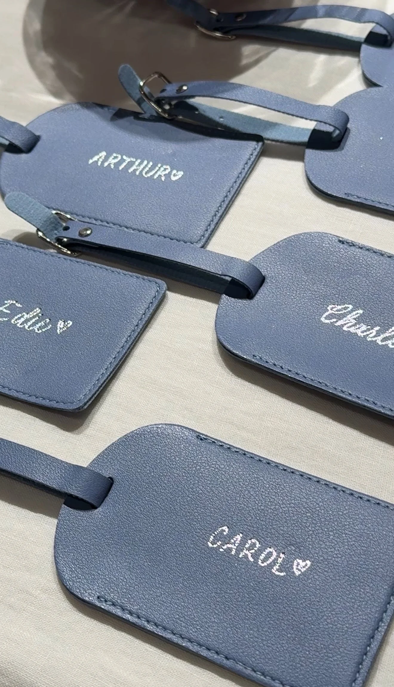 Leather Luggage Tags Personalized in silver calligrapy and print block lettering