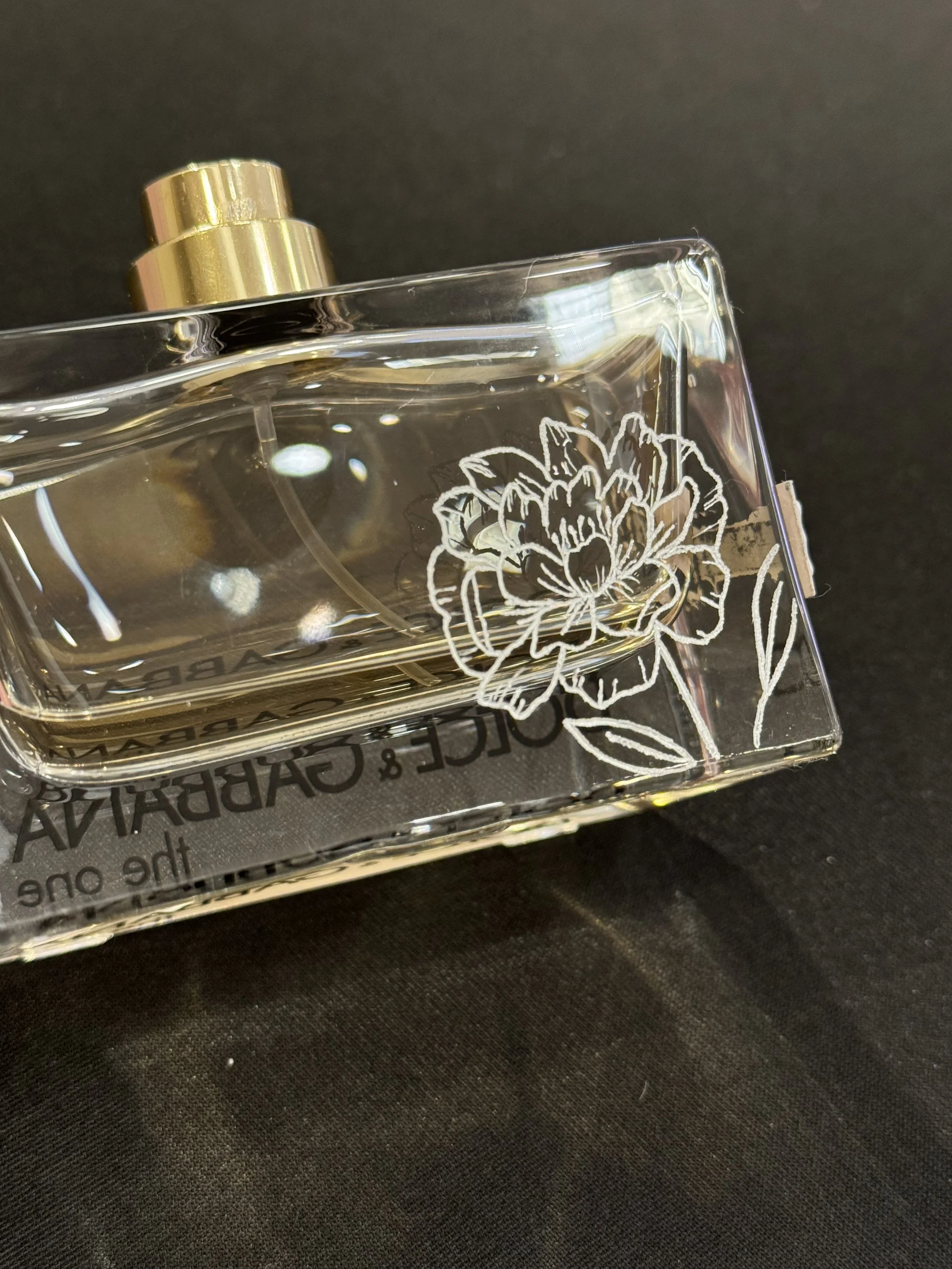 Floral Engraving on Dolce and Gabbana perfume bottle