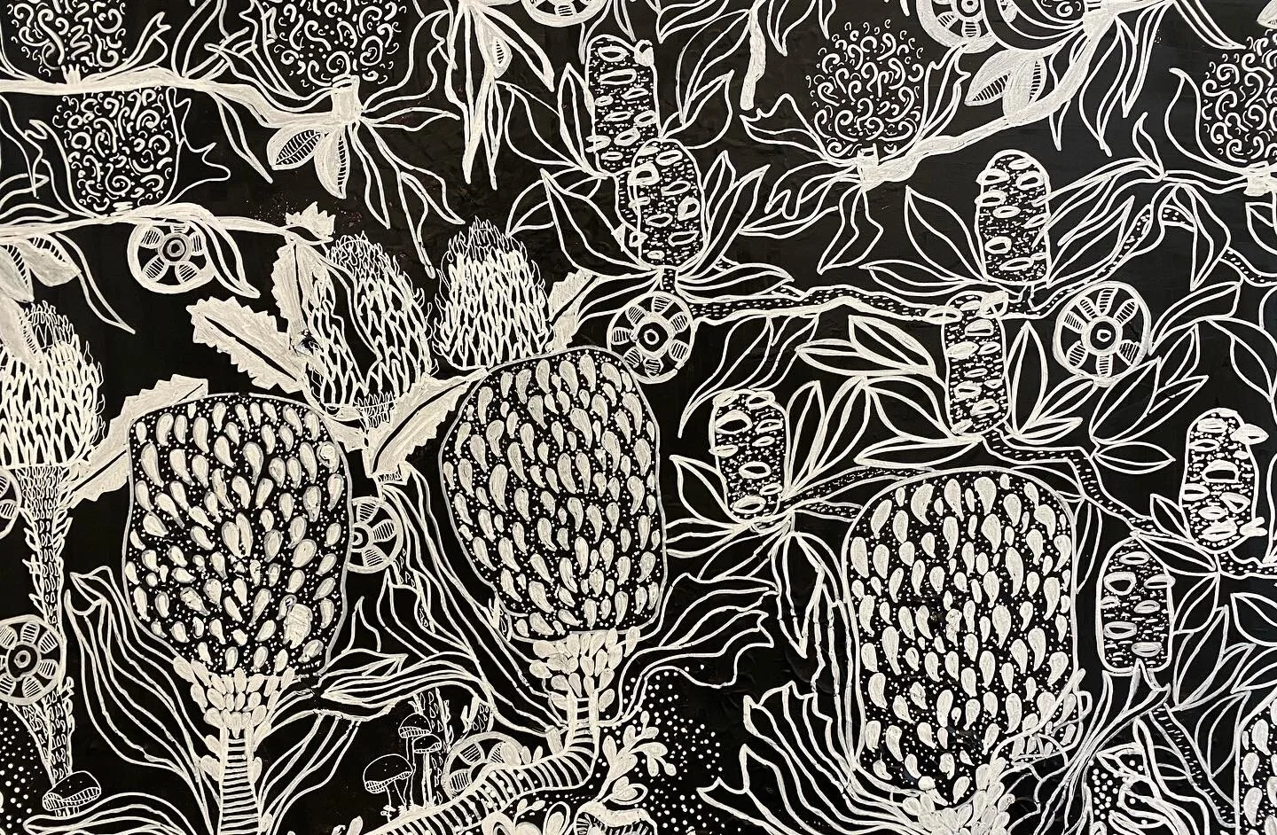Black and white abstract floral and plant pattern with large cone-shaped flowers, elongated leaves, and circular elements, all outlined in white on a black background.
