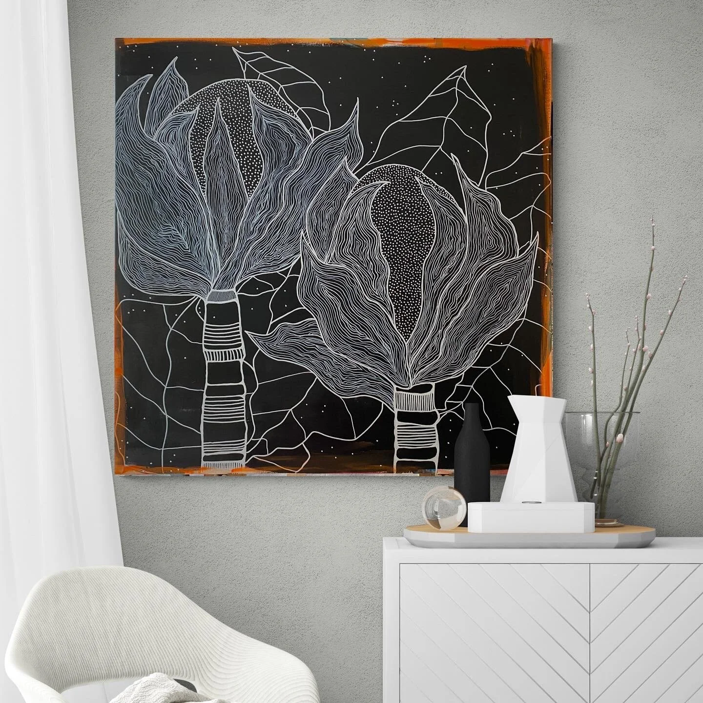 Decorative room with abstract botanical artwork featuring large flowers and a vase on a modern cabinet.