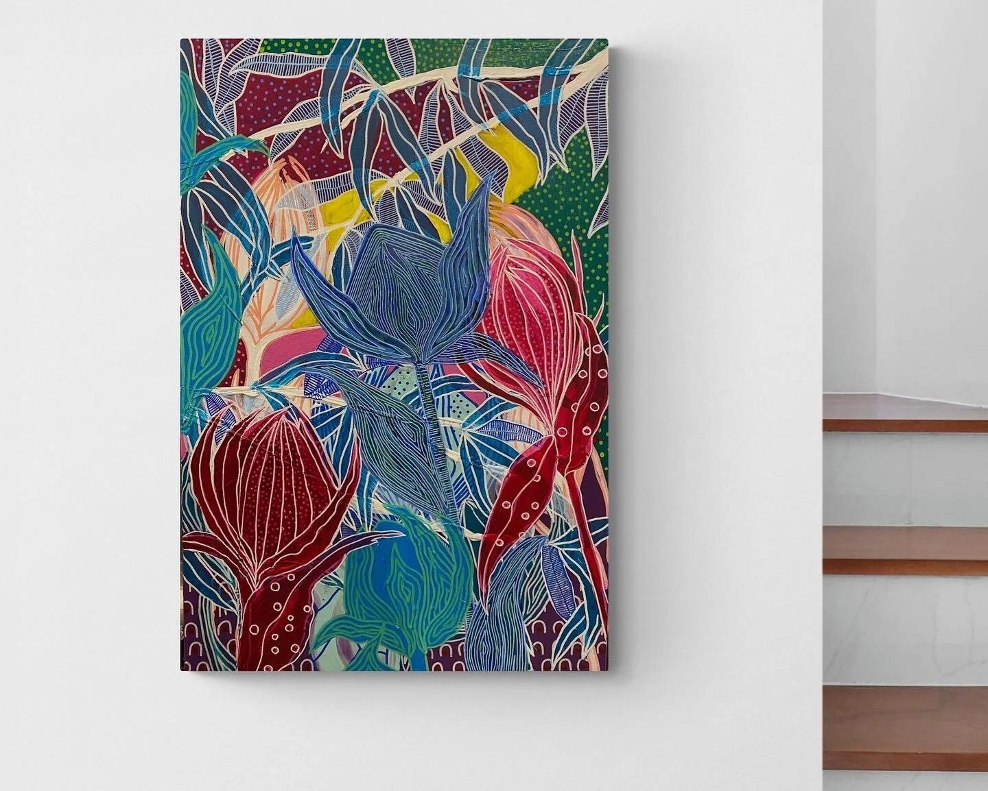 Colorful abstract painting with floral and leaf patterns on a wall next to a staircase. The painting features vibrant hues of blue, red, green, and yellow. It showcases intricate line work and detailed designs, adding an artistic touch to the modern 