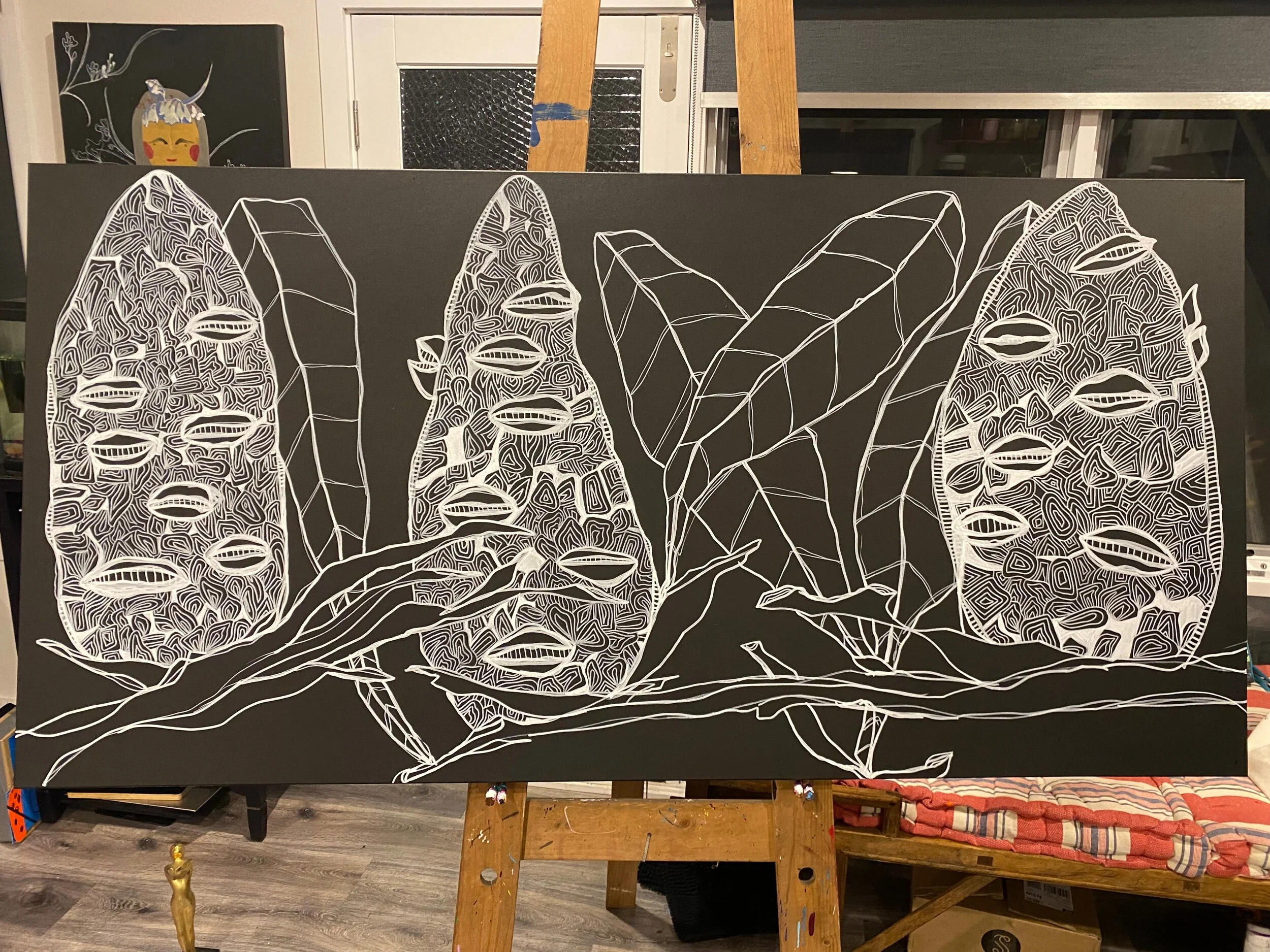 Abstract black and white artwork with intricate patterns and organic forms.