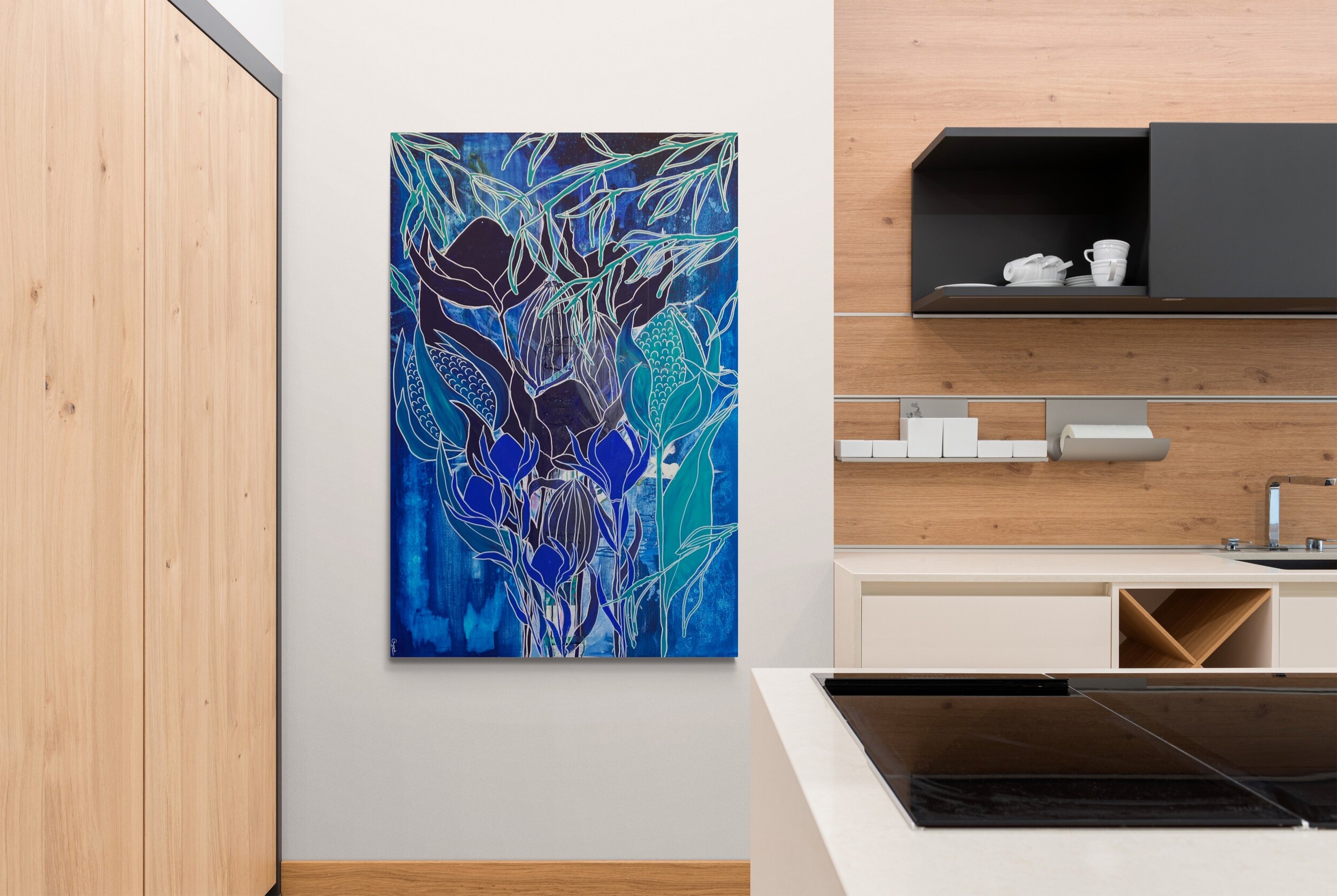 Modern kitchen with abstract blue and green artwork on the wall, wooden cabinetry, open shelves with white dishes, and a countertop with black stovetop.