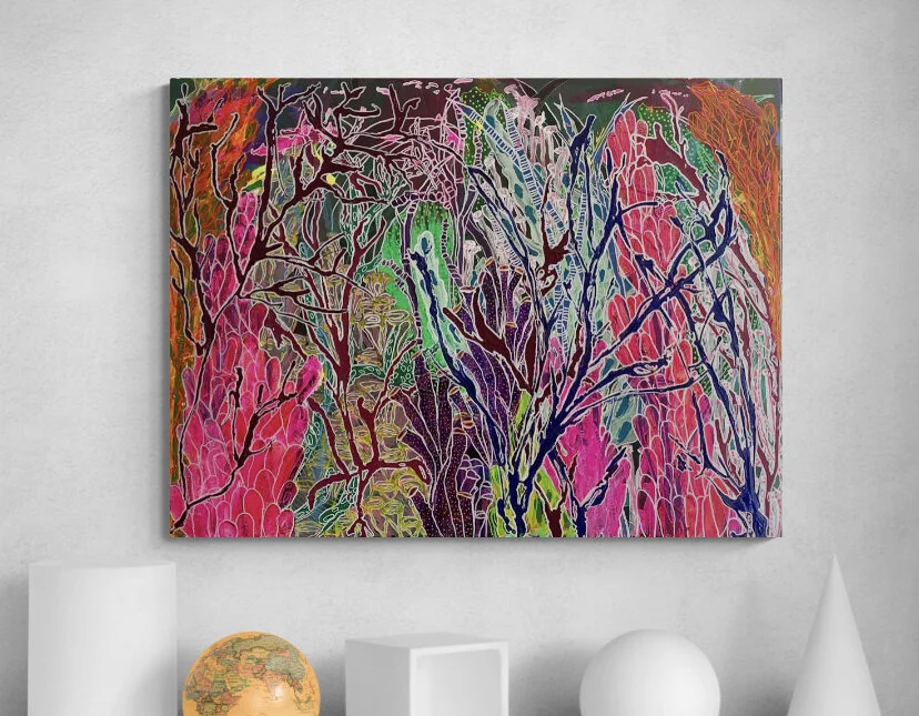 Abstract colorful painting with intricate lines and organic shapes displayed on a wall above decorative objects, including a globe and geometric shapes.