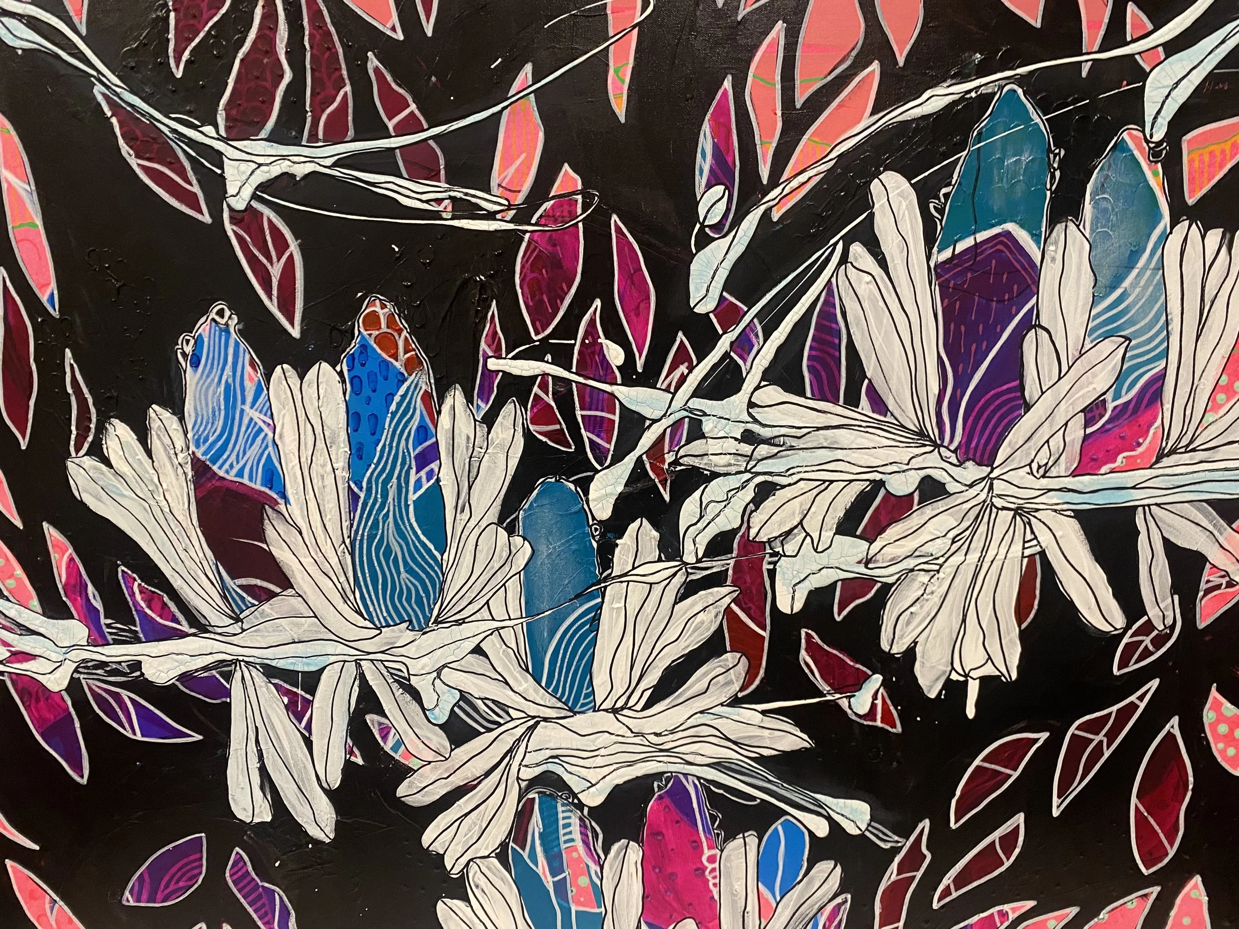 Abstract art featuring white outlined branch and leaf shapes against a dark background, with colorful, patterned blue and pink leaves.