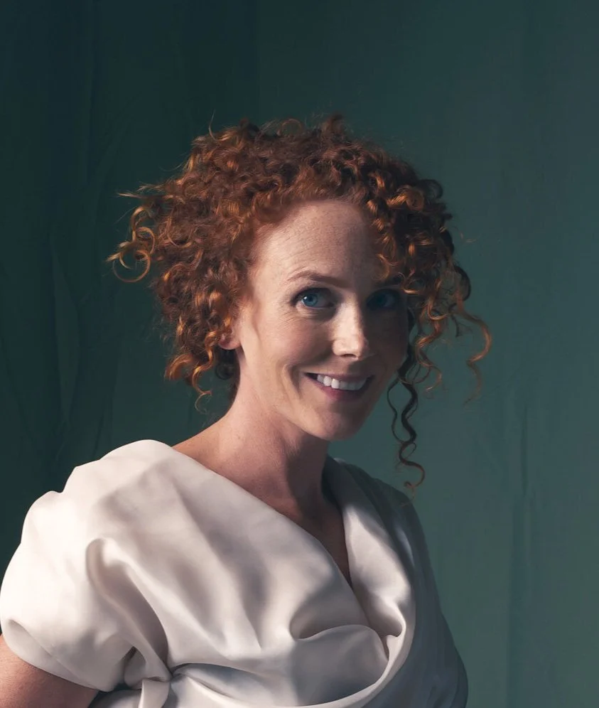 Elegant portrait of a pregnant woman, her hands lovingly cradling her belly