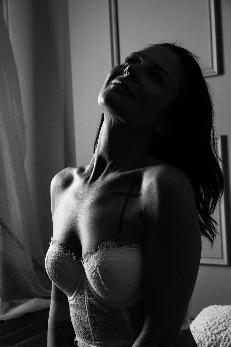 Bridal boudoir photography in Perth highlighting intricate lace lingerie and the bride's unique tattoo in an artistic composition.