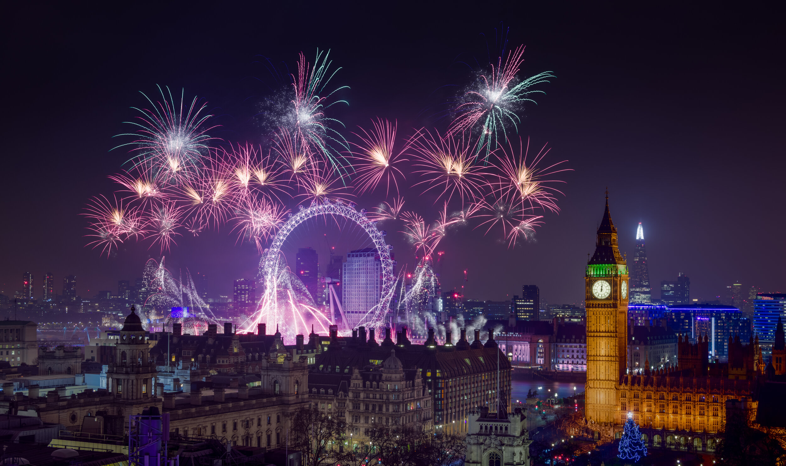 The final blended result: New Year's Eve fireworks over the London Eye, with Elizabeth Tower (Big Ben) and Westminster lit up in the foreground, made by blending the scene shot with the fireworks shot