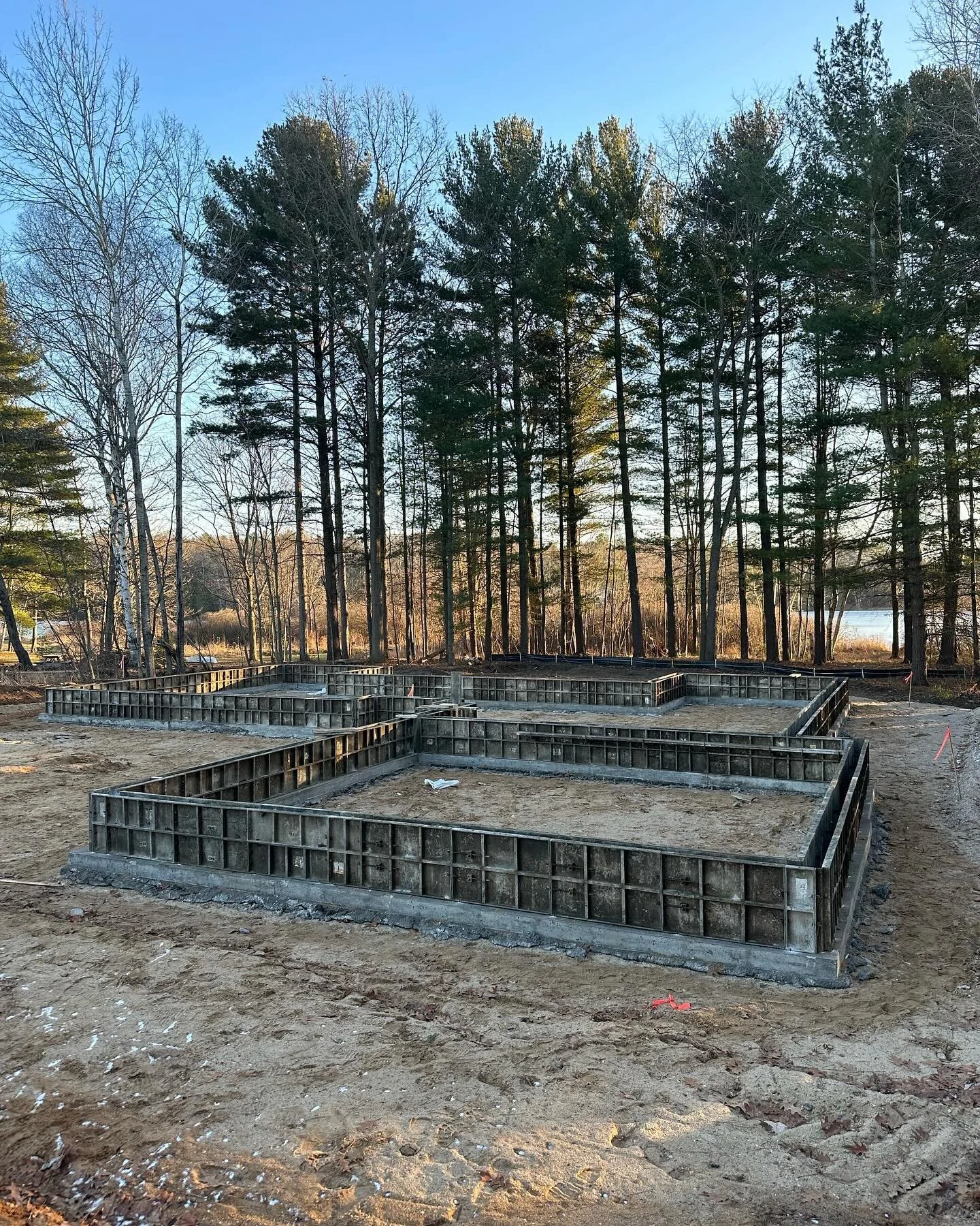 Last foundation of the year! Fingers crossed the snow holds off another week 🤞🏻 #traversecity #builder #homebuilder