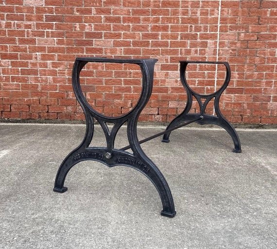 28" Cast Iron Dining Table Legs in Rustic Black with Cinncinnati Embossment front image