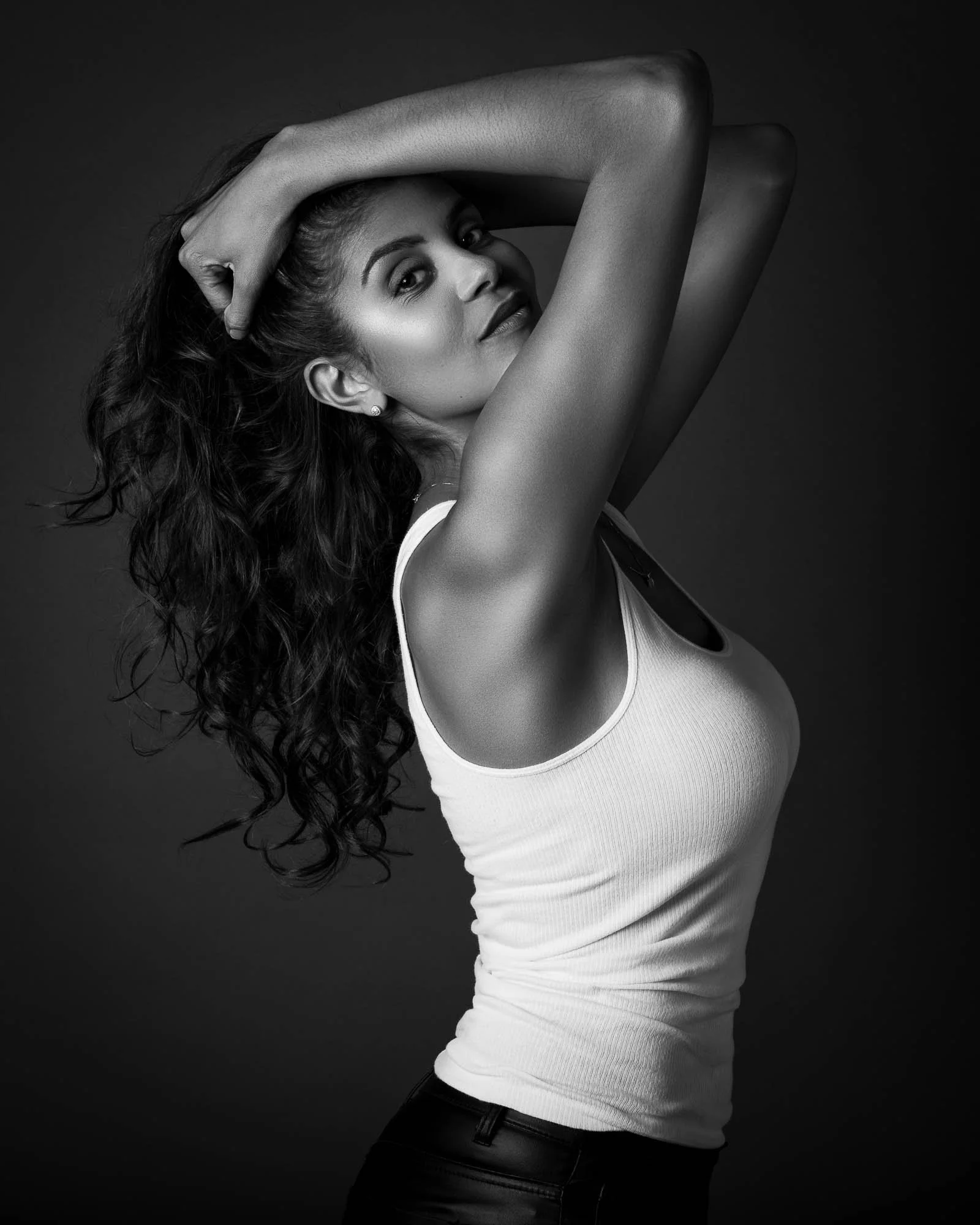 modern boudoir photography woman studio portrait black and white