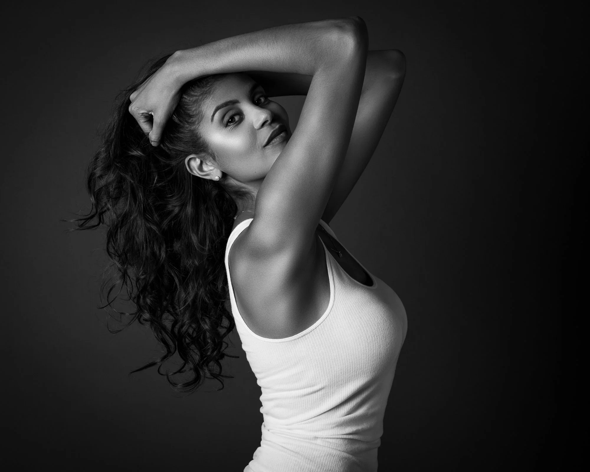 modern boudoir photography woman studio portrait black and white