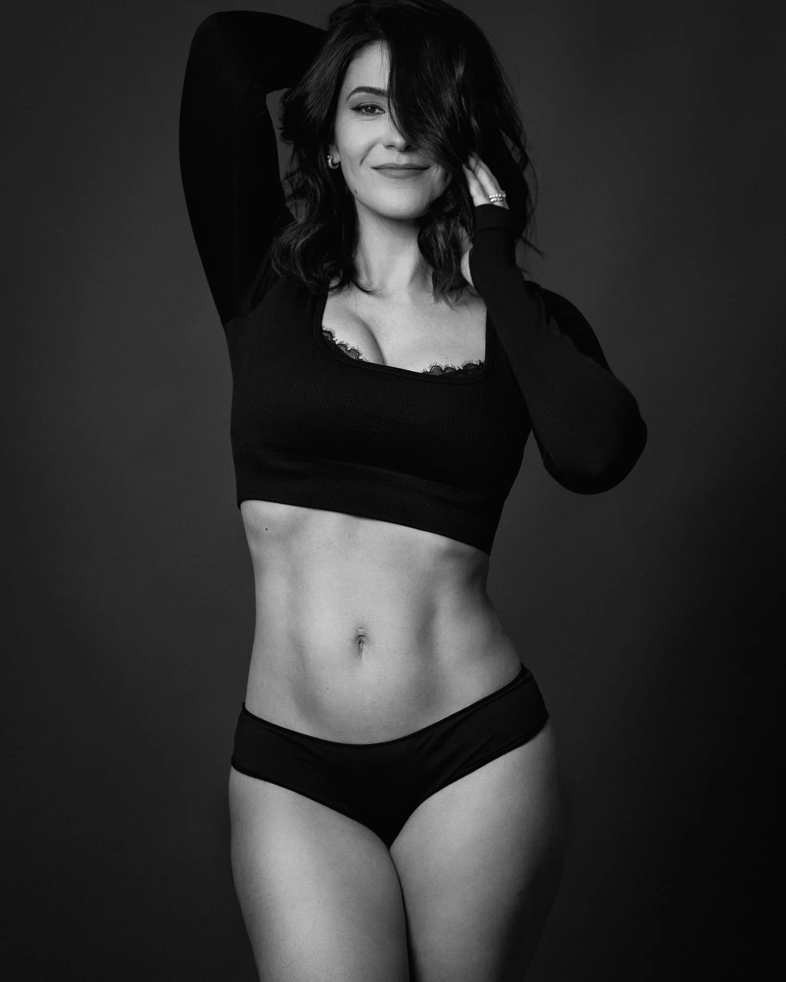 boudoir photography woman confident lingerie black and white