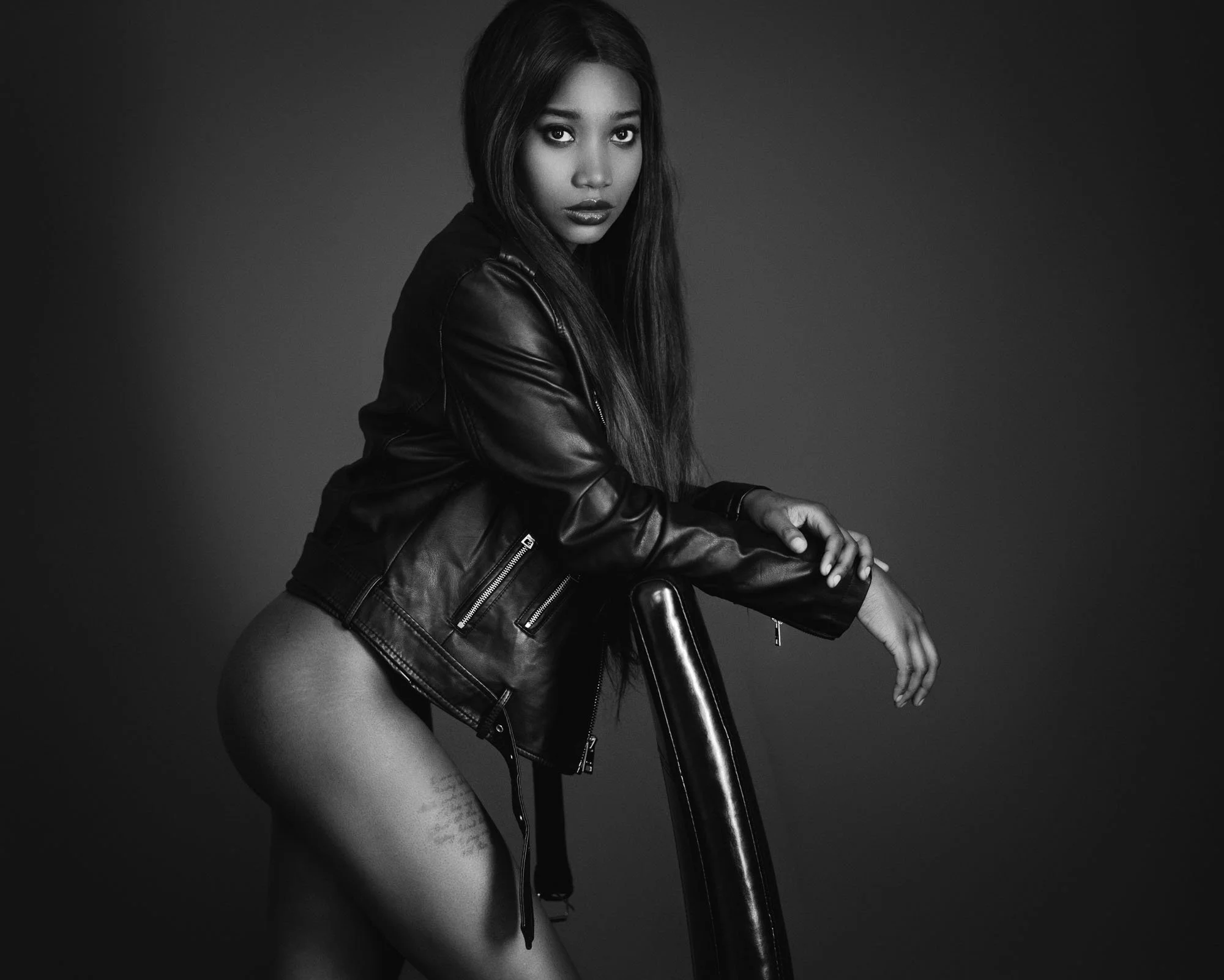 modern boudoir photography woman leather jacket Chicago studio