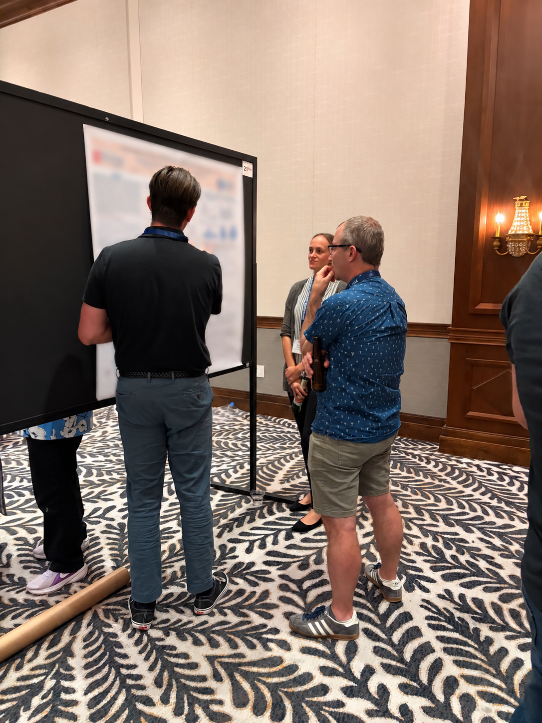 Blurred Poster Conference Discussion.png