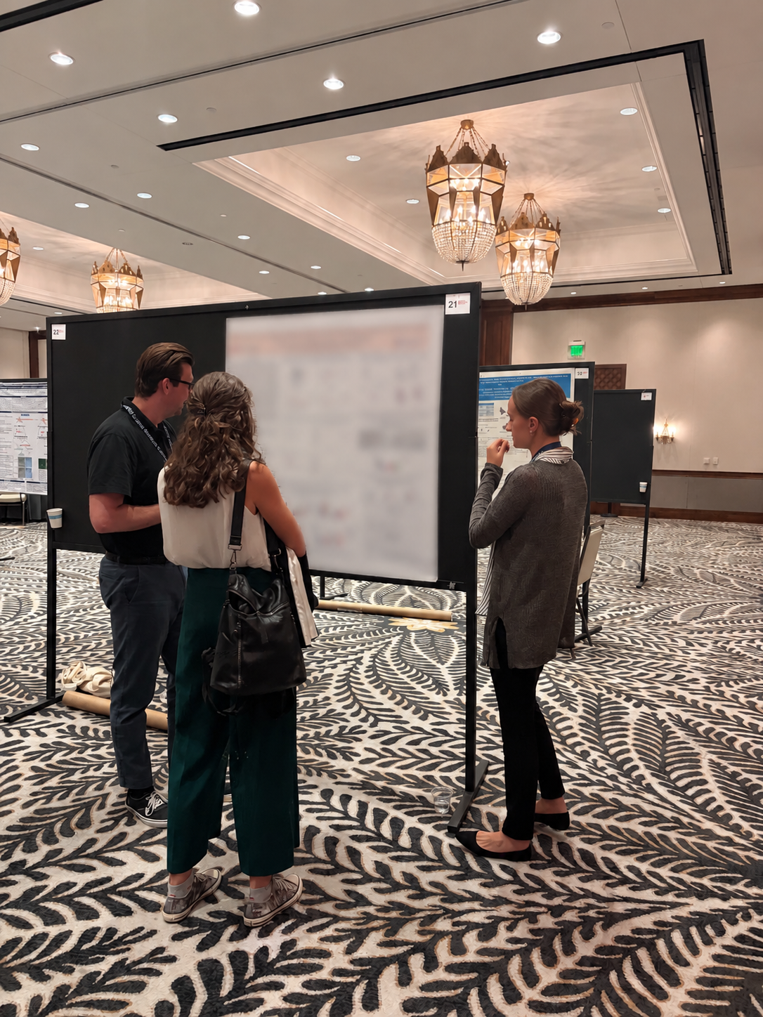Conference Poster Session Discussion.png