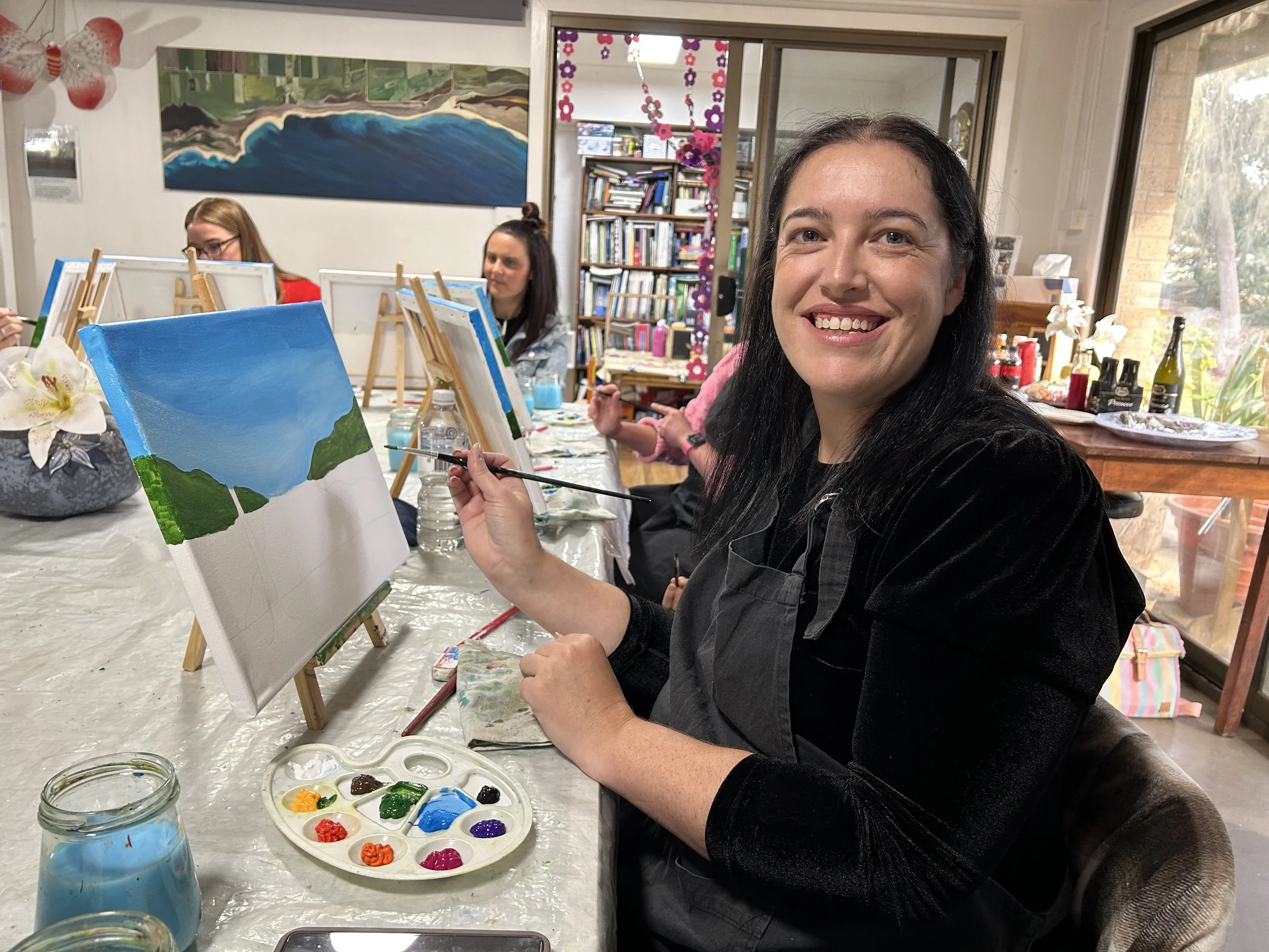 Jenny instructing a smiling participant 