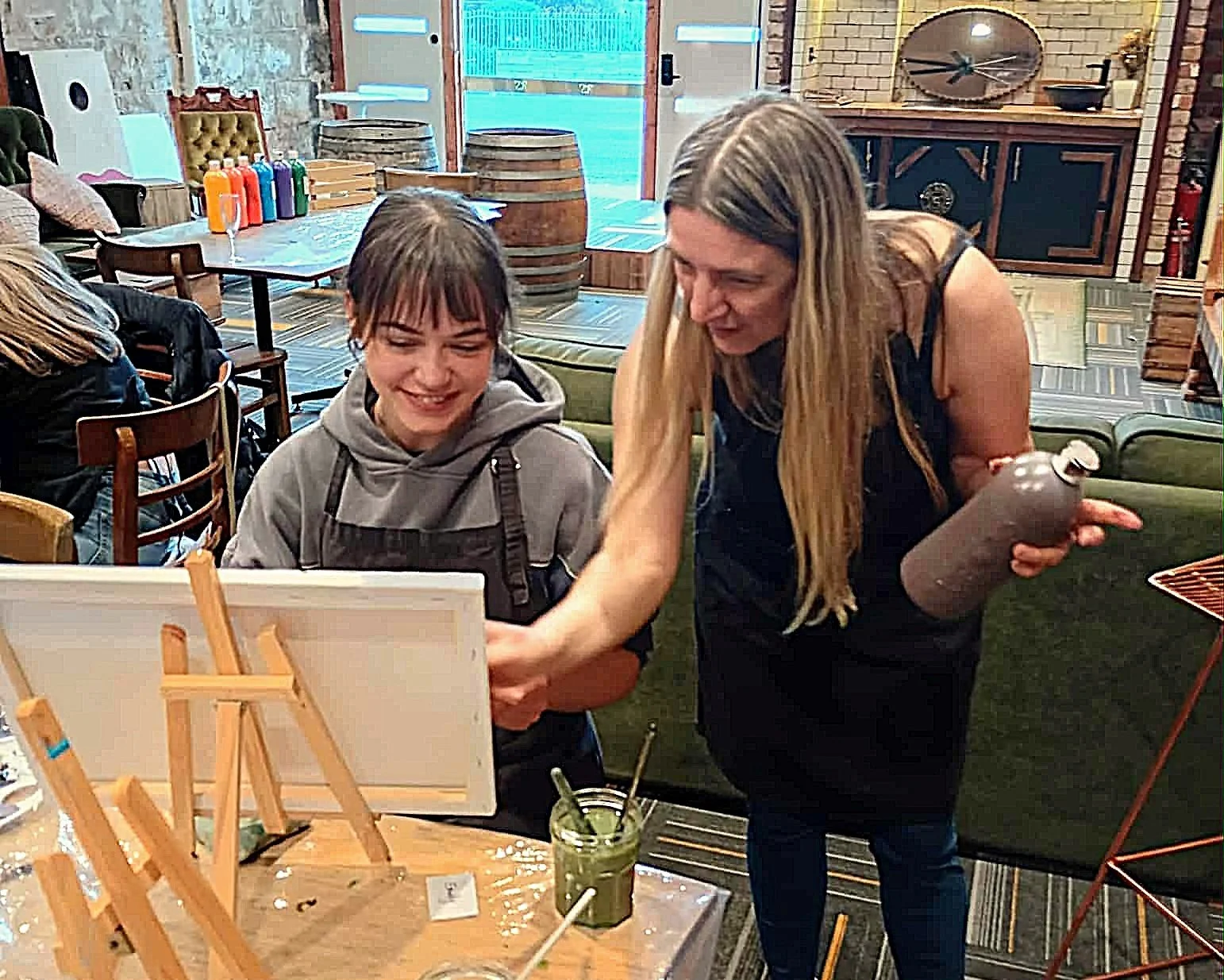 Jenny instructing a smiling participant 